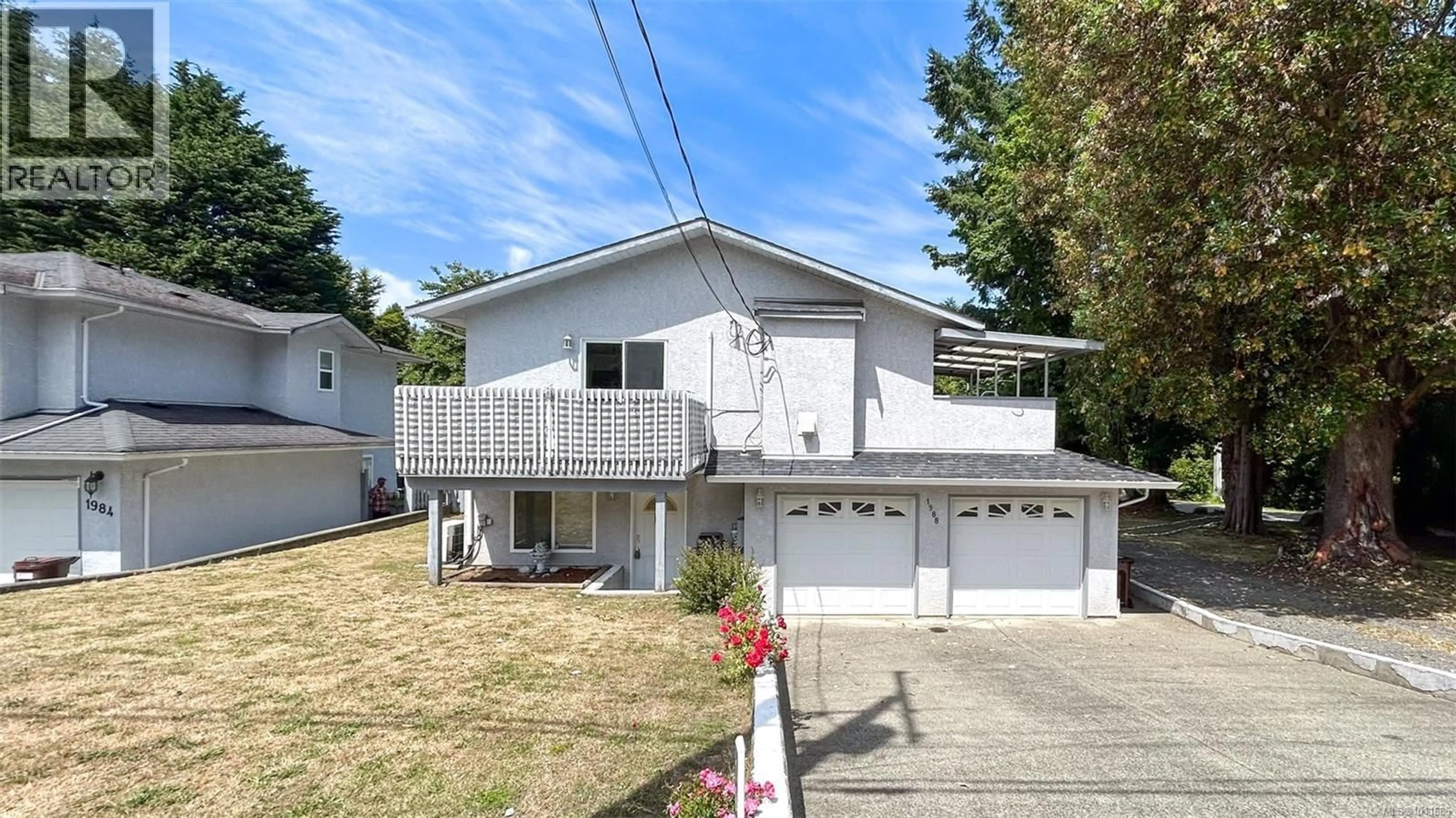 Home with vinyl exterior material, street for 1988 MCTAVISH ROAD, North Saanich British Columbia V8L1C9