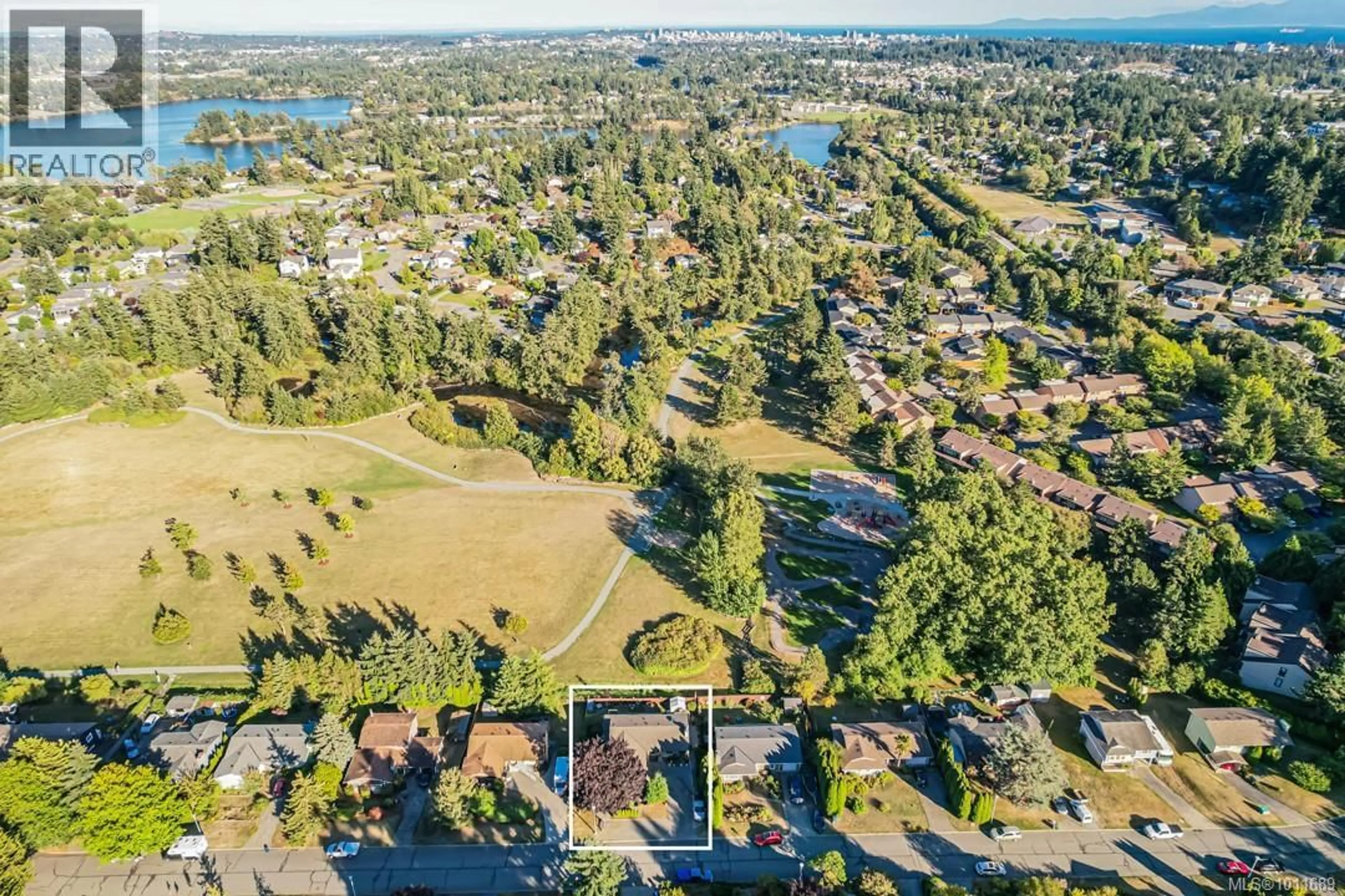 A pic from outside/outdoor area/front of a property/back of a property/a pic from drone, water/lake/river/ocean view for 128 PADDOCK PLACE, View Royal British Columbia V9B5G2
