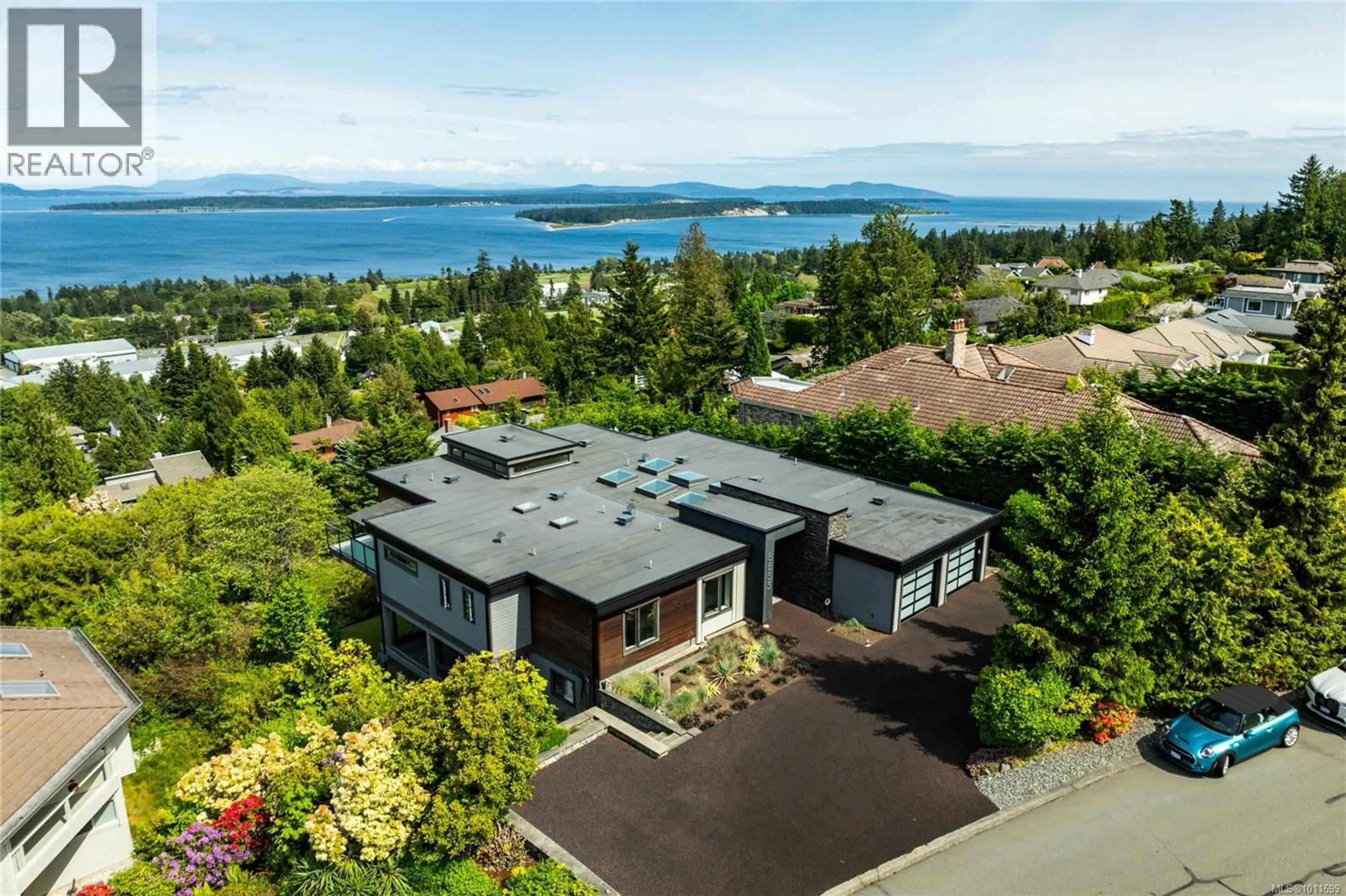 A pic from outside/outdoor area/front of a property/back of a property/a pic from drone, water/lake/river/ocean view for 8853 PARK PACIFIC TERRACE, North Saanich British Columbia V8L4S1