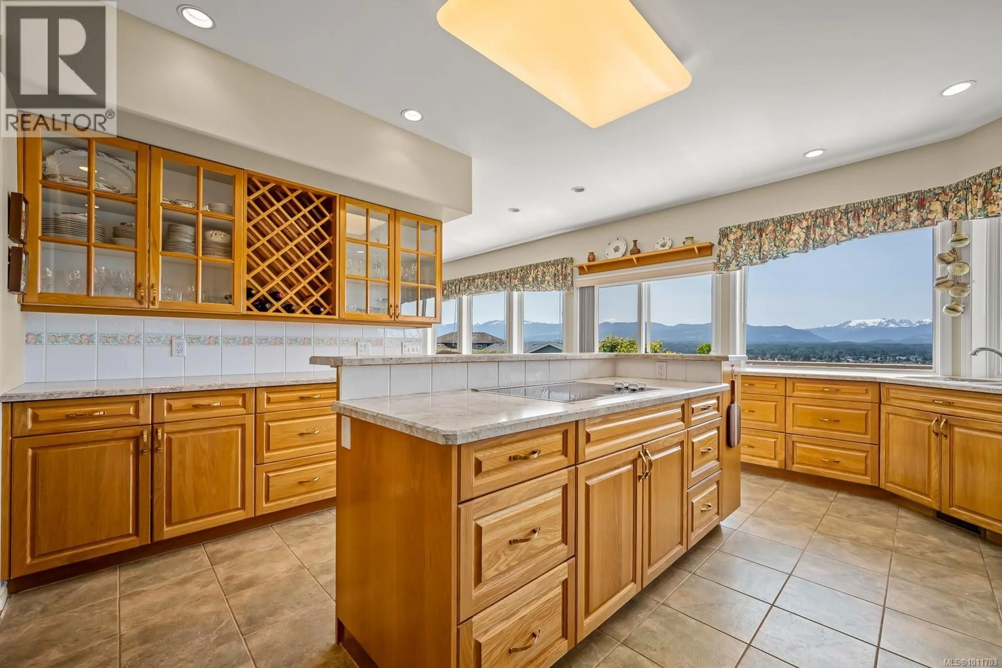 Open concept kitchen, ceramic/tile floor for 1597 TRUMPETER CRESCENT, Courtenay British Columbia V9N8W6