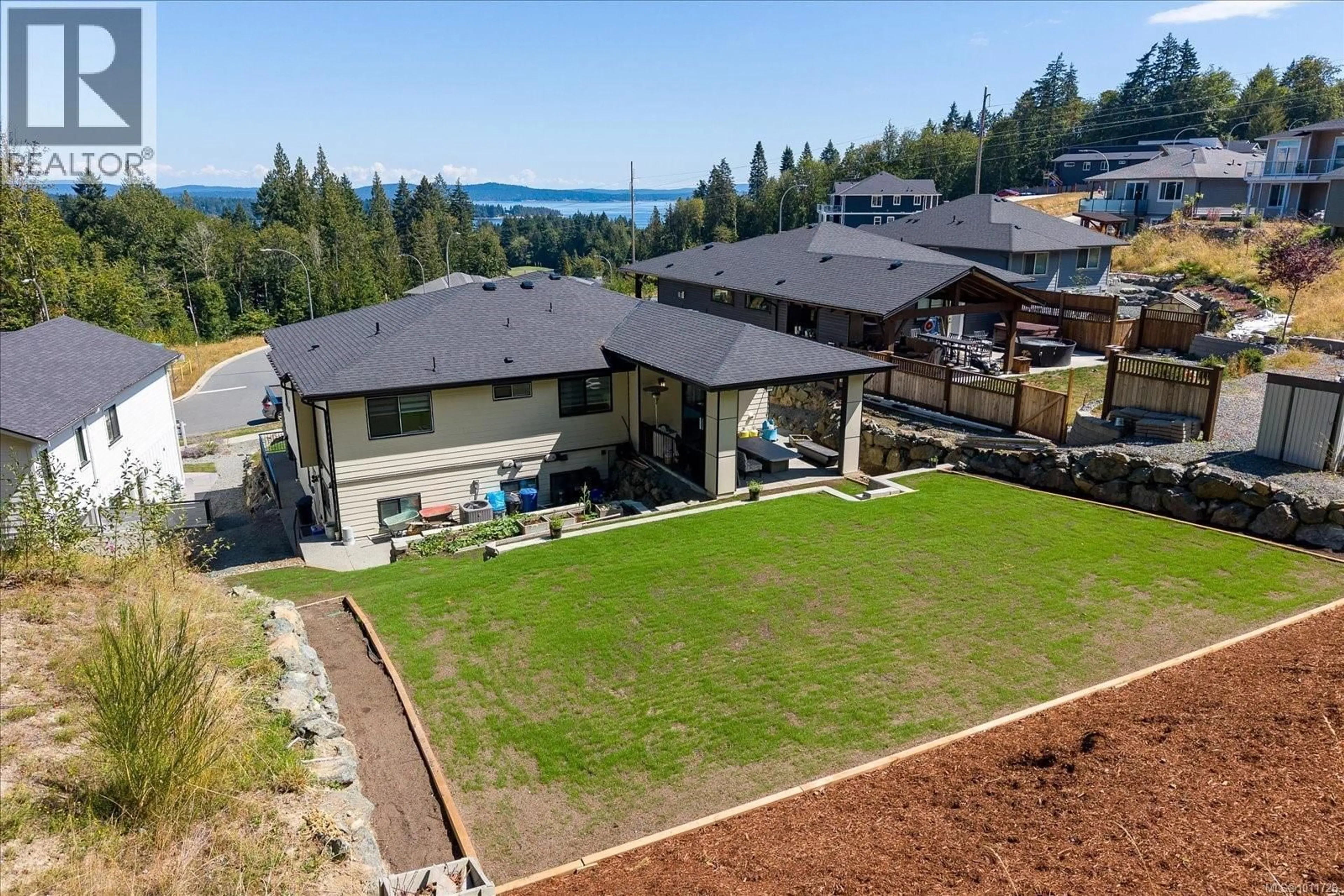 A pic from outside/outdoor area/front of a property/back of a property/a pic from drone, water/lake/river/ocean view for 405 COLONIA DRIVE SOUTH, Ladysmith British Columbia V9B0B8