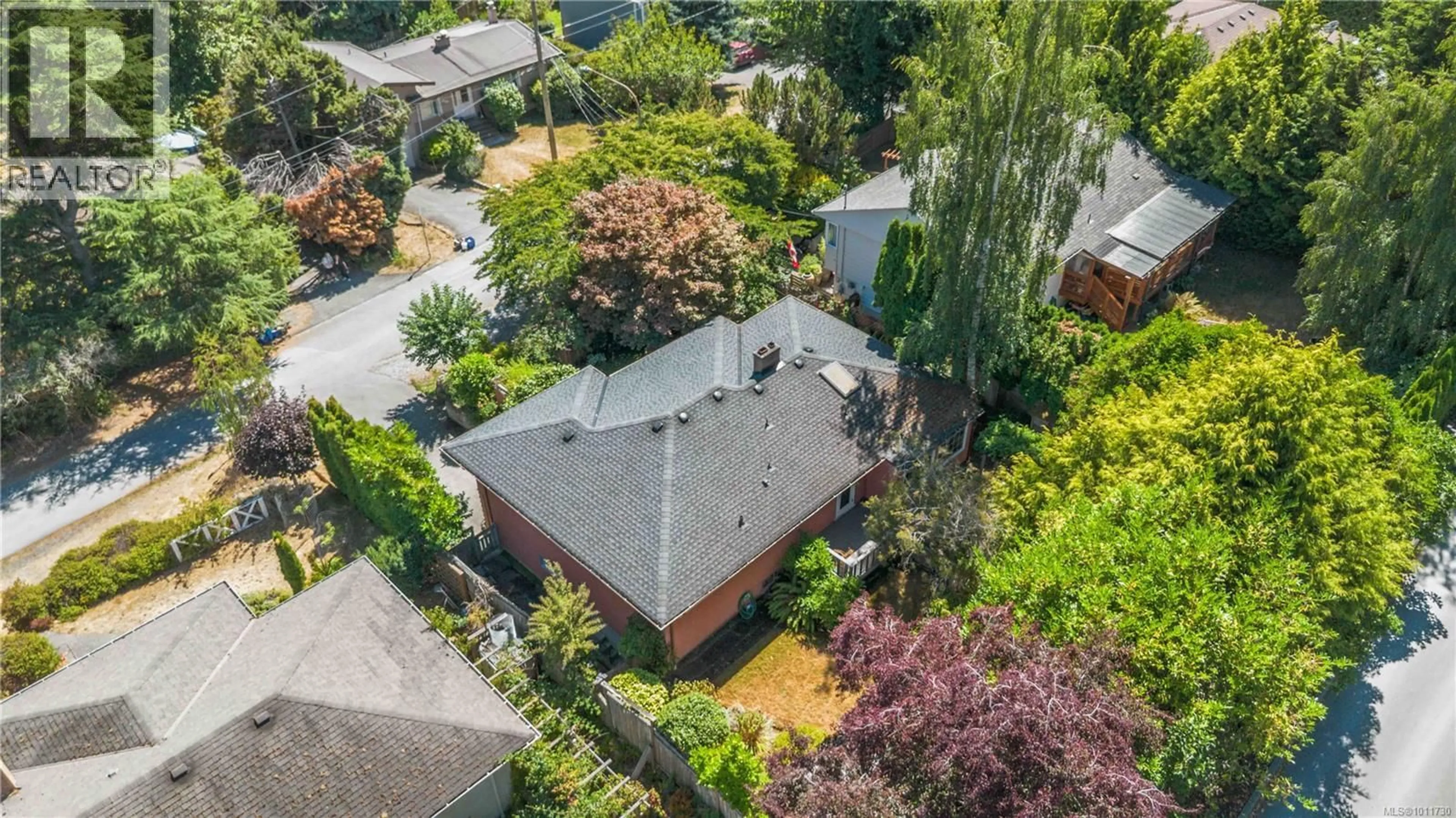 A pic from outside/outdoor area/front of a property/back of a property/a pic from drone, street for 3836 PITCOMBE PLACE, Saanich British Columbia V8N4B9