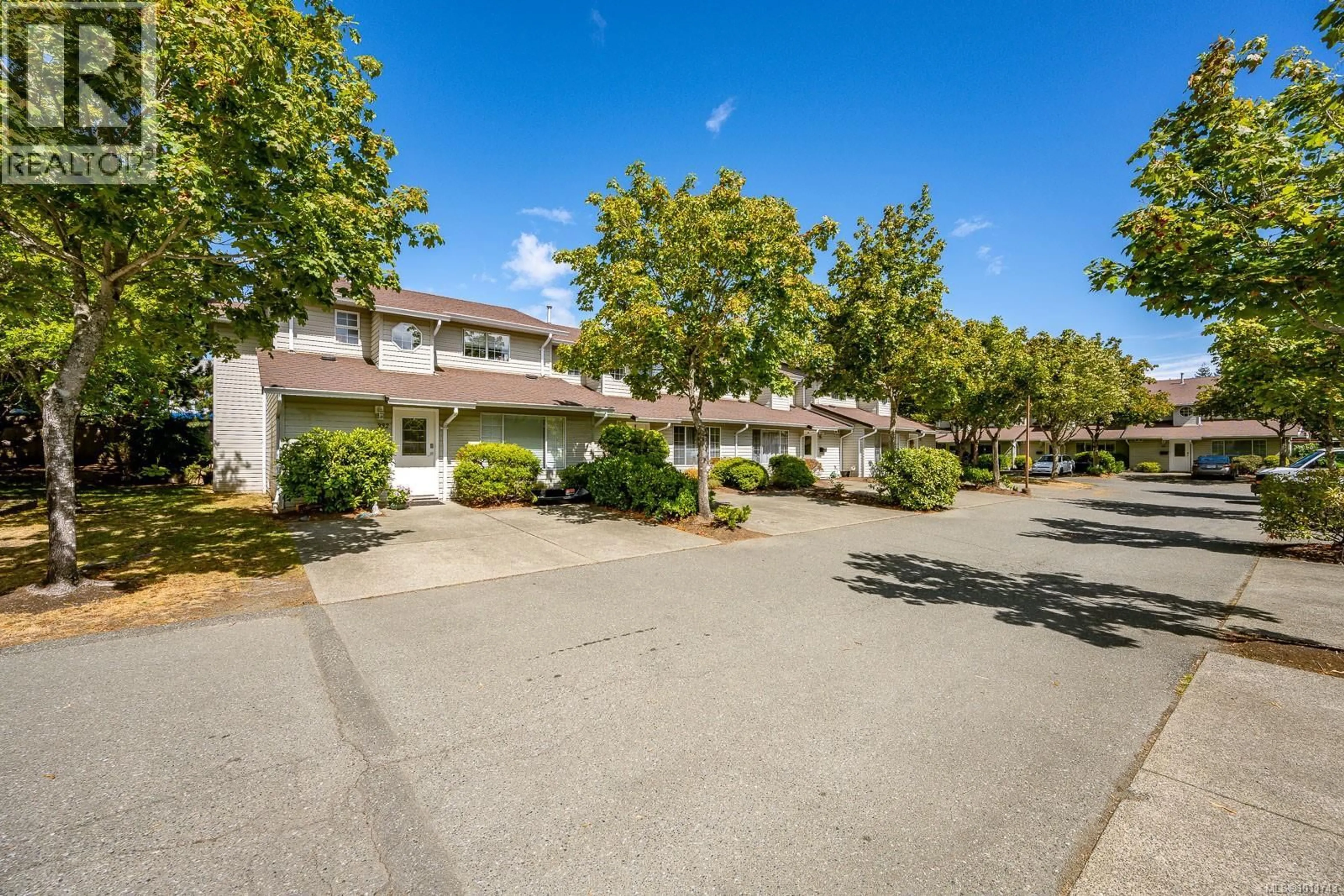A pic from outside/outdoor area/front of a property/back of a property/a pic from drone, street for 334 - 680 MURRELET DRIVE, Comox British Columbia V9M3P2