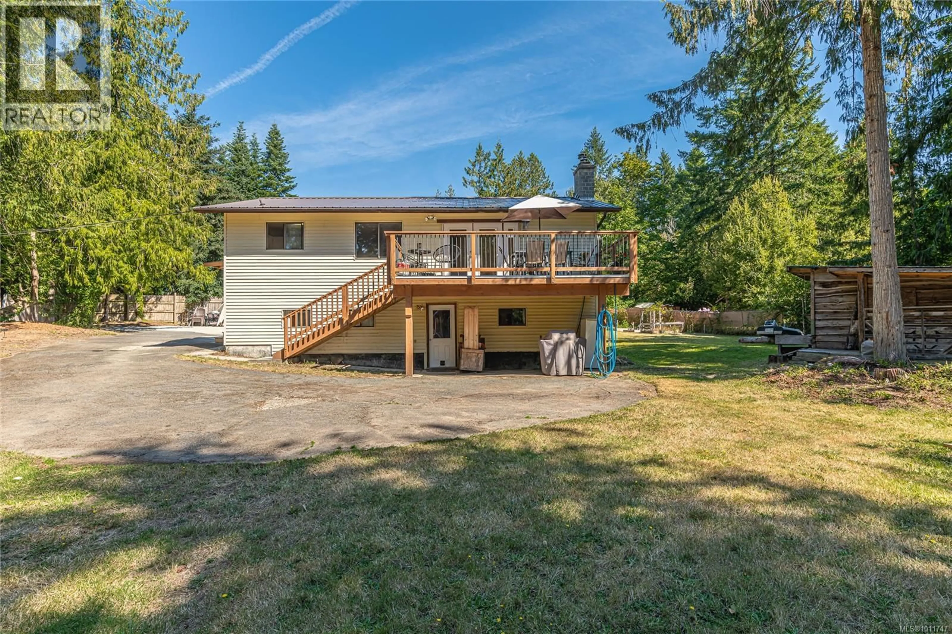 A pic from outside/outdoor area/front of a property/back of a property/a pic from drone, unknown for 210 WILDWOOD CRESCENT, Salt Spring British Columbia V8K2N7