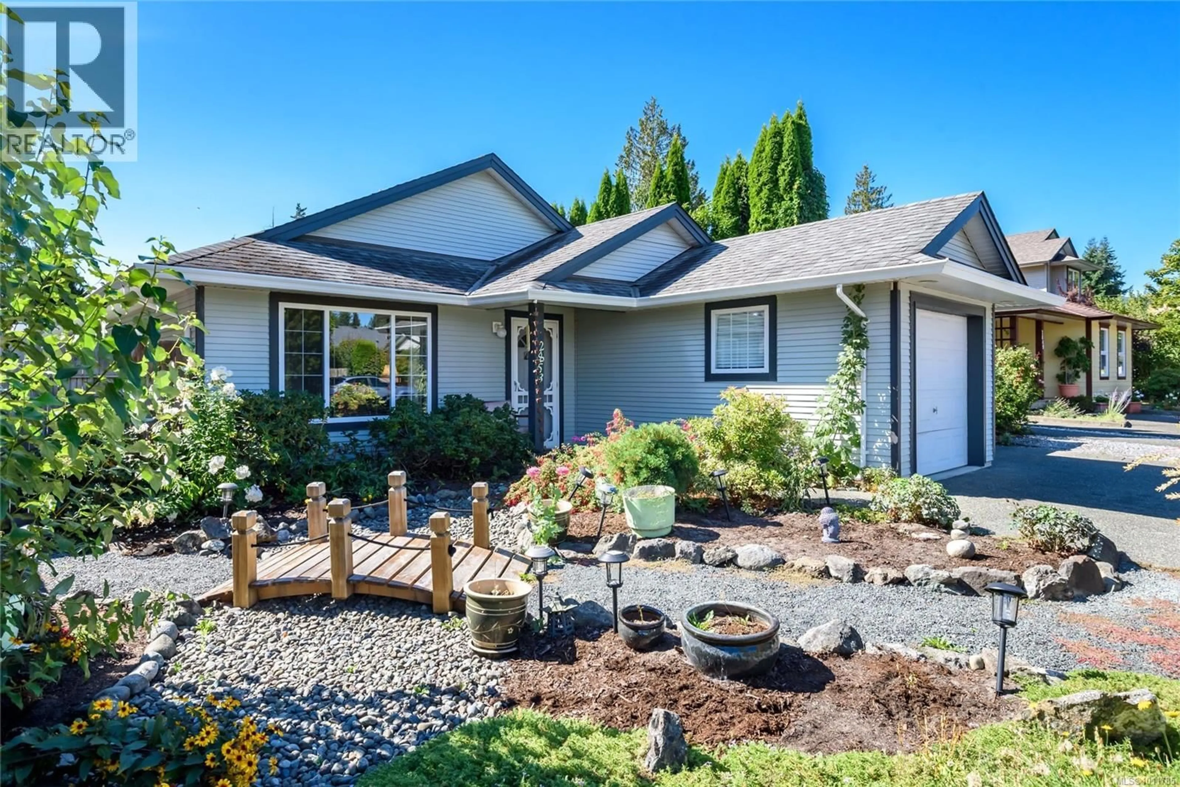Home with vinyl exterior material, street for 2853 PENRITH AVENUE, Cumberland British Columbia V0R1S0