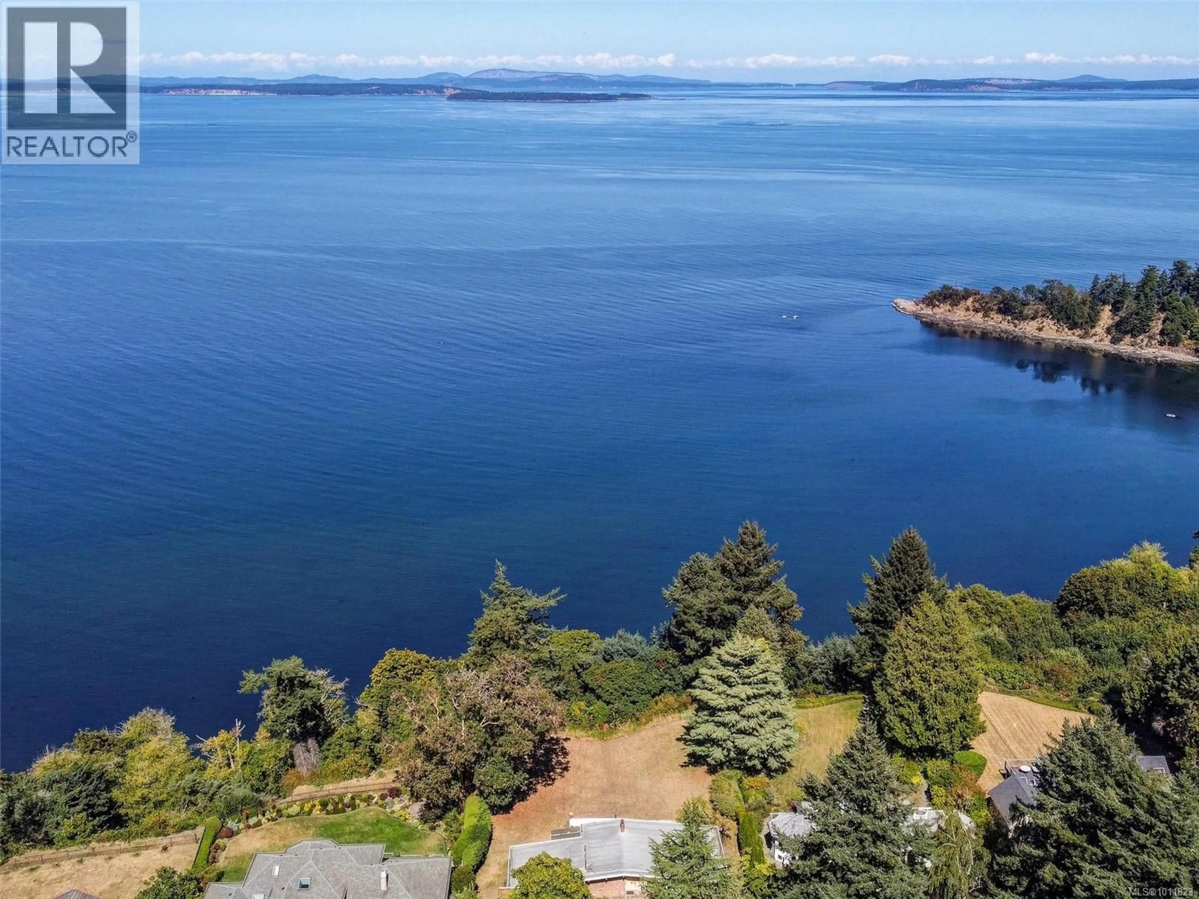 A pic from outside/outdoor area/front of a property/back of a property/a pic from drone, water/lake/river/ocean view for 4598 TORQUAY DRIVE, Saanich British Columbia V8N3L7