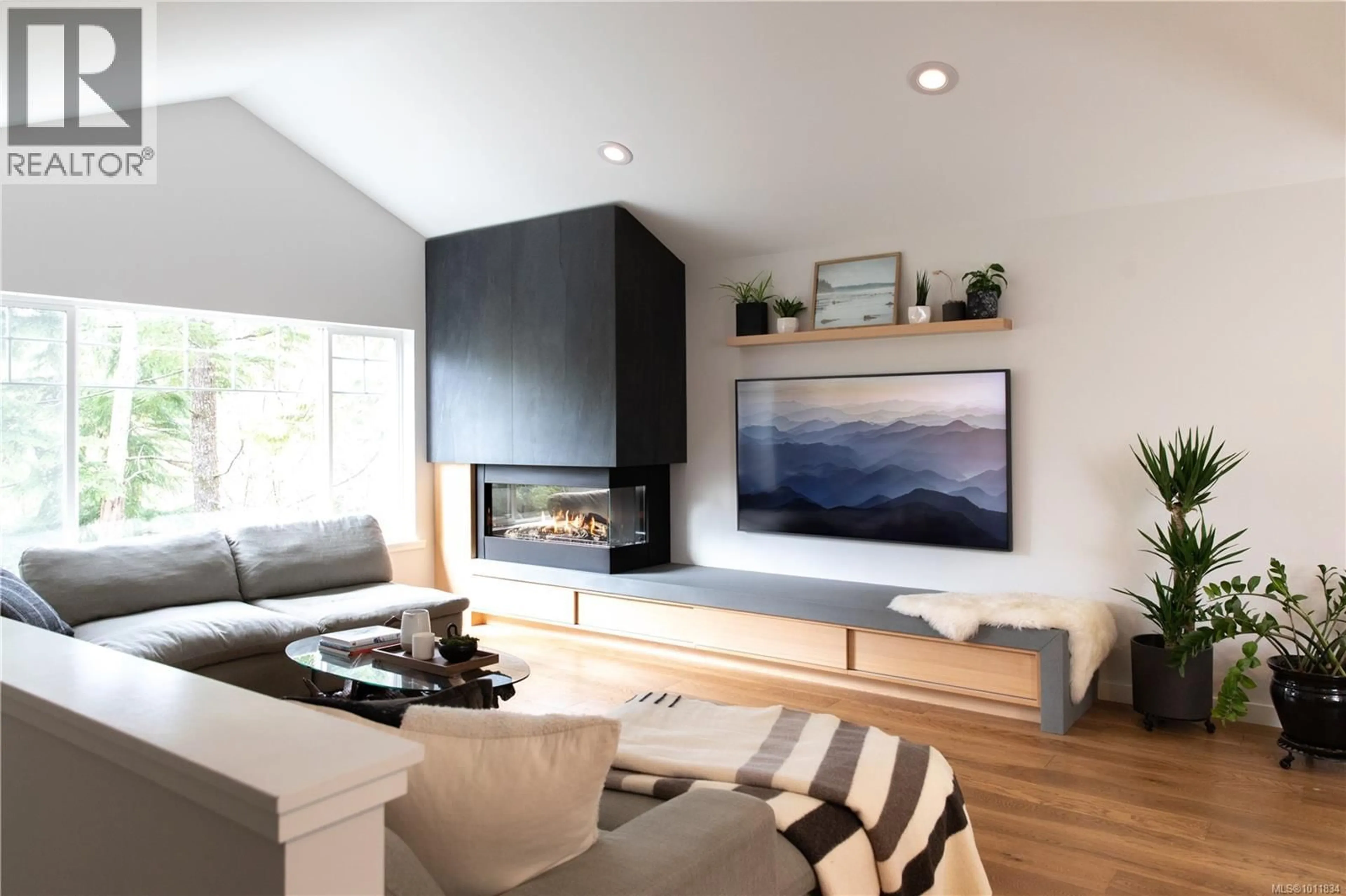 Living room with furniture, wood/laminate floor for 1887 ST. JACQUES BOULEVARD, Ucluelet British Columbia V0R3A0