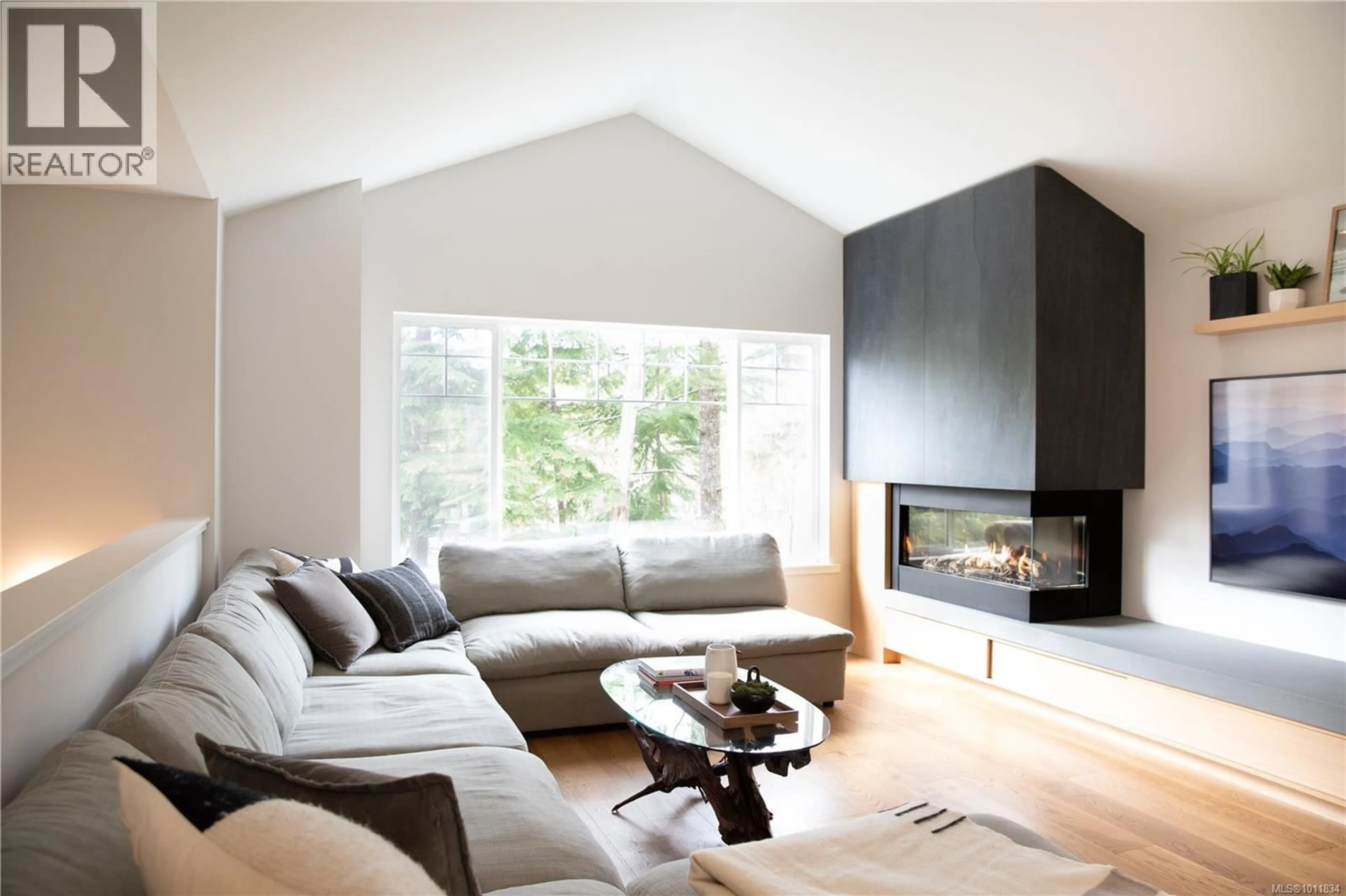 Living room with furniture, wood/laminate floor for 1887 ST. JACQUES BOULEVARD, Ucluelet British Columbia V0R3A0