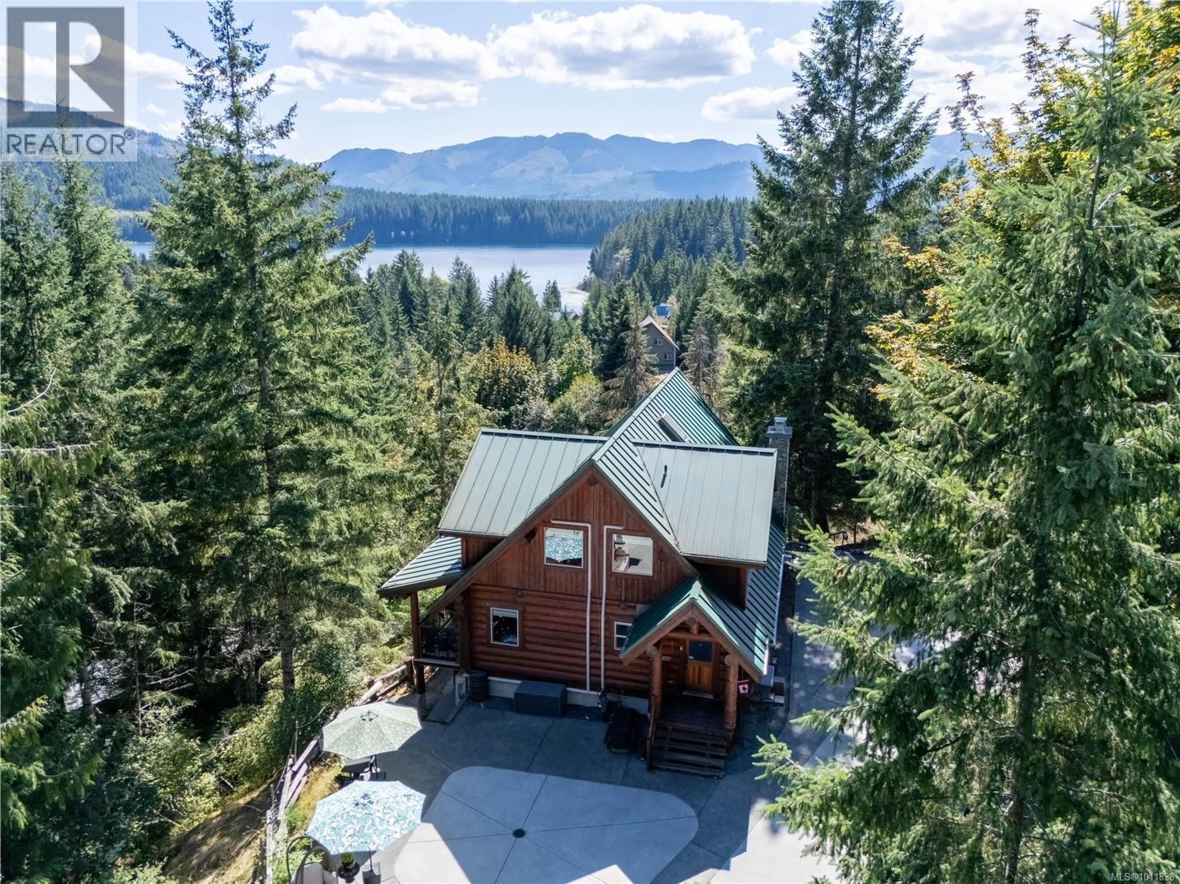 A pic from outside/outdoor area/front of a property/back of a property/a pic from drone, water/lake/river/ocean view for 9215 KESTREL DRIVE, Lake Cowichan British Columbia V0R2G1