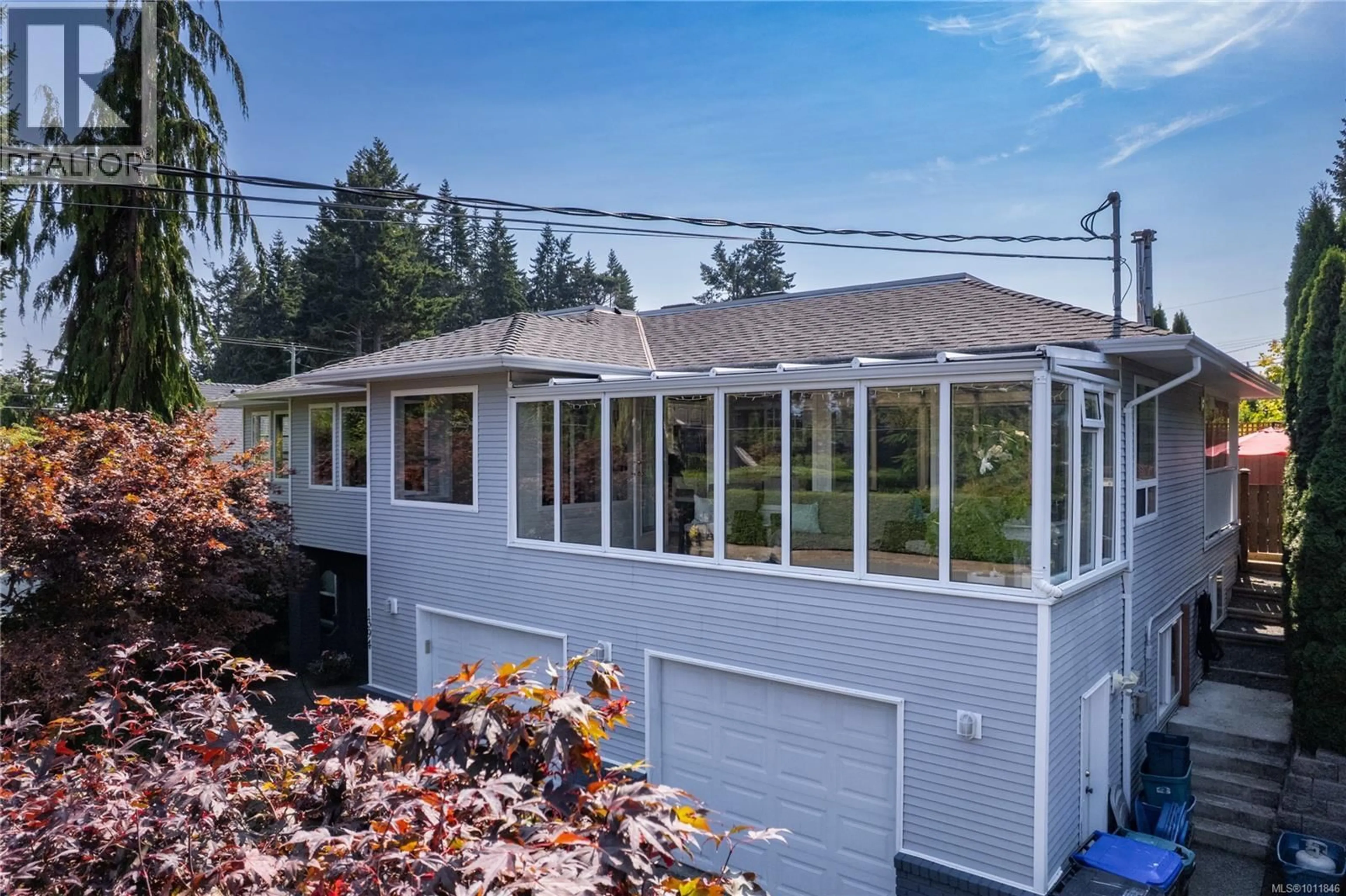 Home with vinyl exterior material, street for 1394 MALLARD ROAD, Qualicum Beach British Columbia V9P2A3