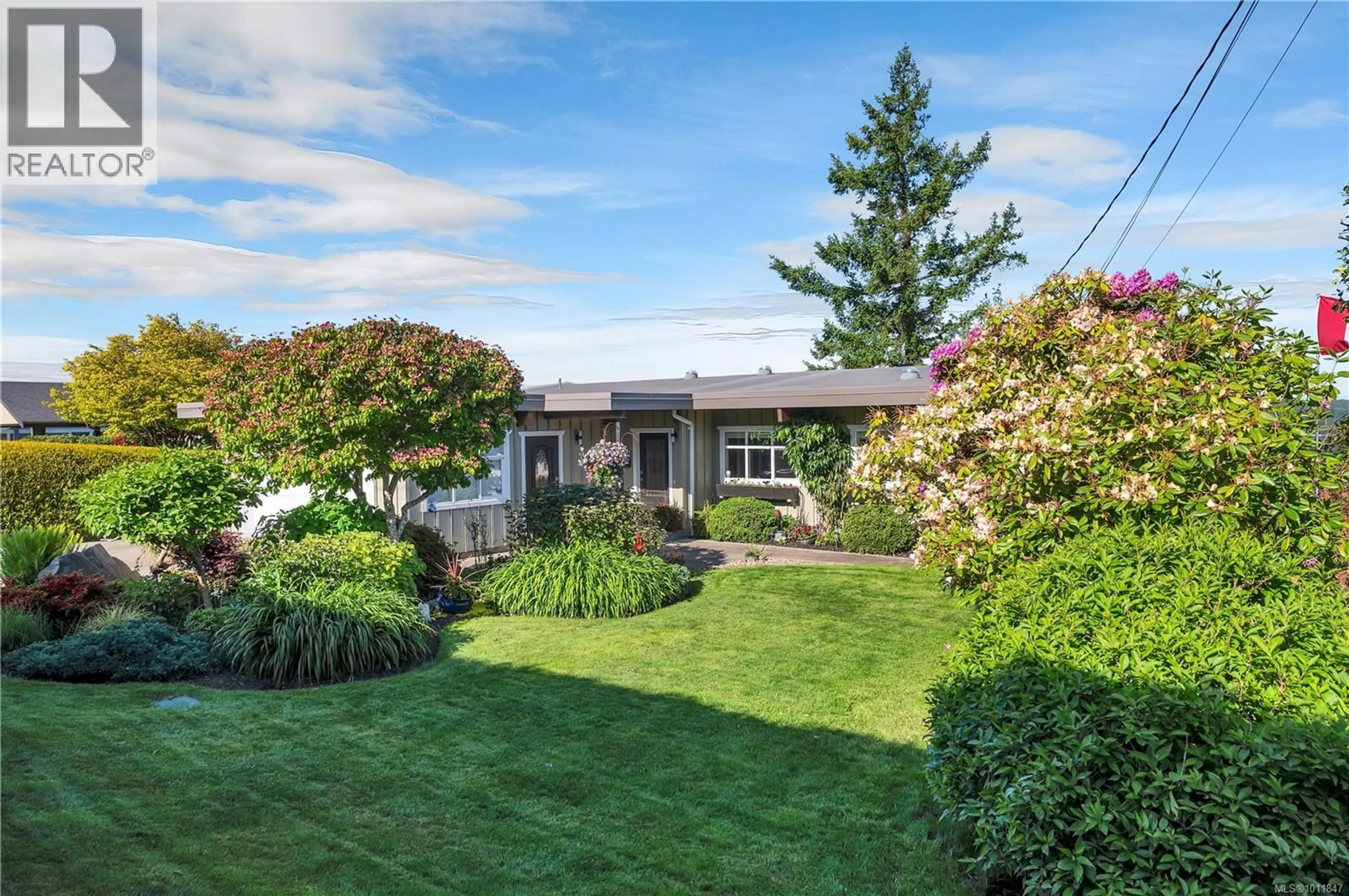 A pic from outside/outdoor area/front of a property/back of a property/a pic from drone, street for 235 THULIN STREET SOUTH, Campbell River British Columbia V9W2J9