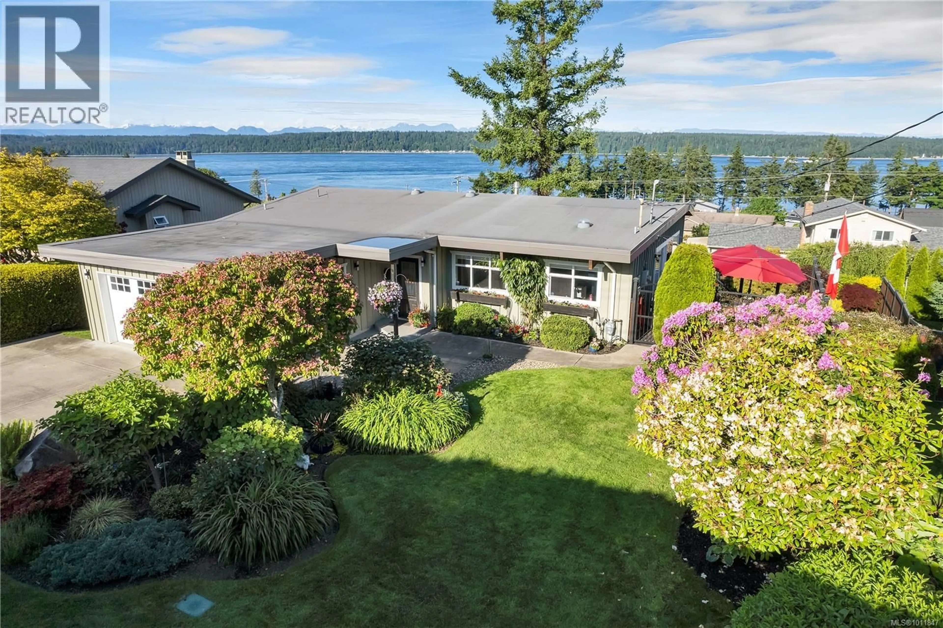 A pic from outside/outdoor area/front of a property/back of a property/a pic from drone, water/lake/river/ocean view for 235 THULIN STREET SOUTH, Campbell River British Columbia V9W2J9