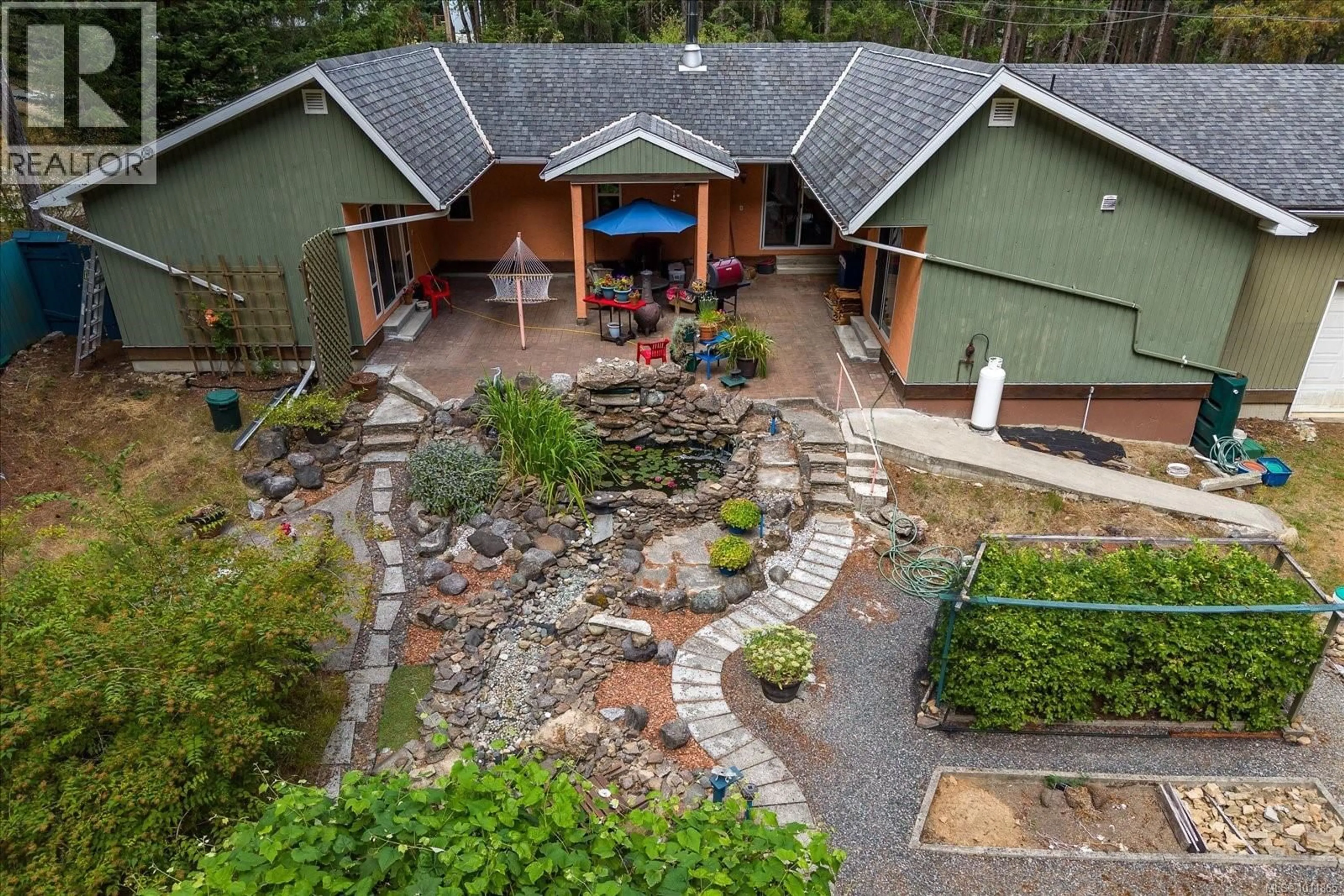 A pic from outside/outdoor area/front of a property/back of a property/a pic from drone, unknown for 3097 COMMODORE WAY, Gabriola Island British Columbia V0R1X7