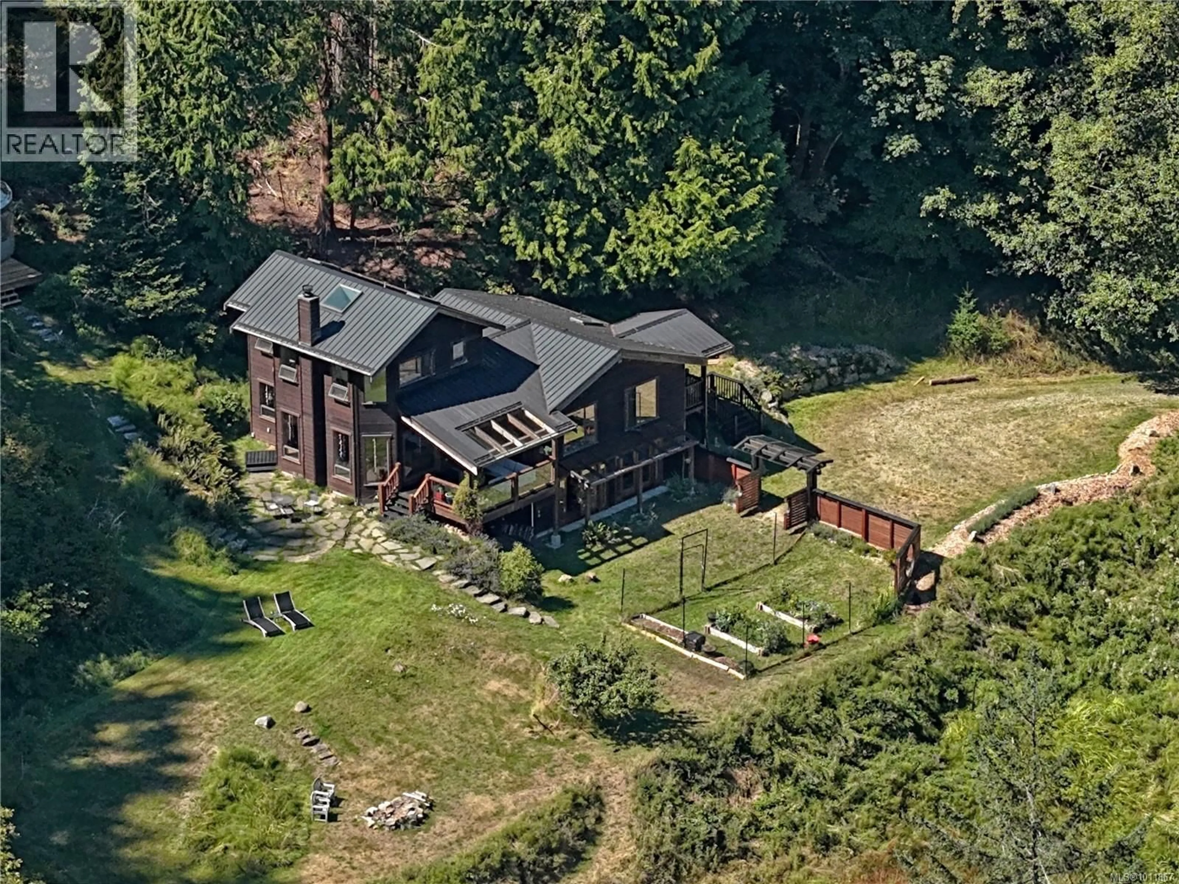 A pic from outside/outdoor area/front of a property/back of a property/a pic from drone, building for 494 ISABELLA POINT ROAD, Salt Spring British Columbia V8K1V4