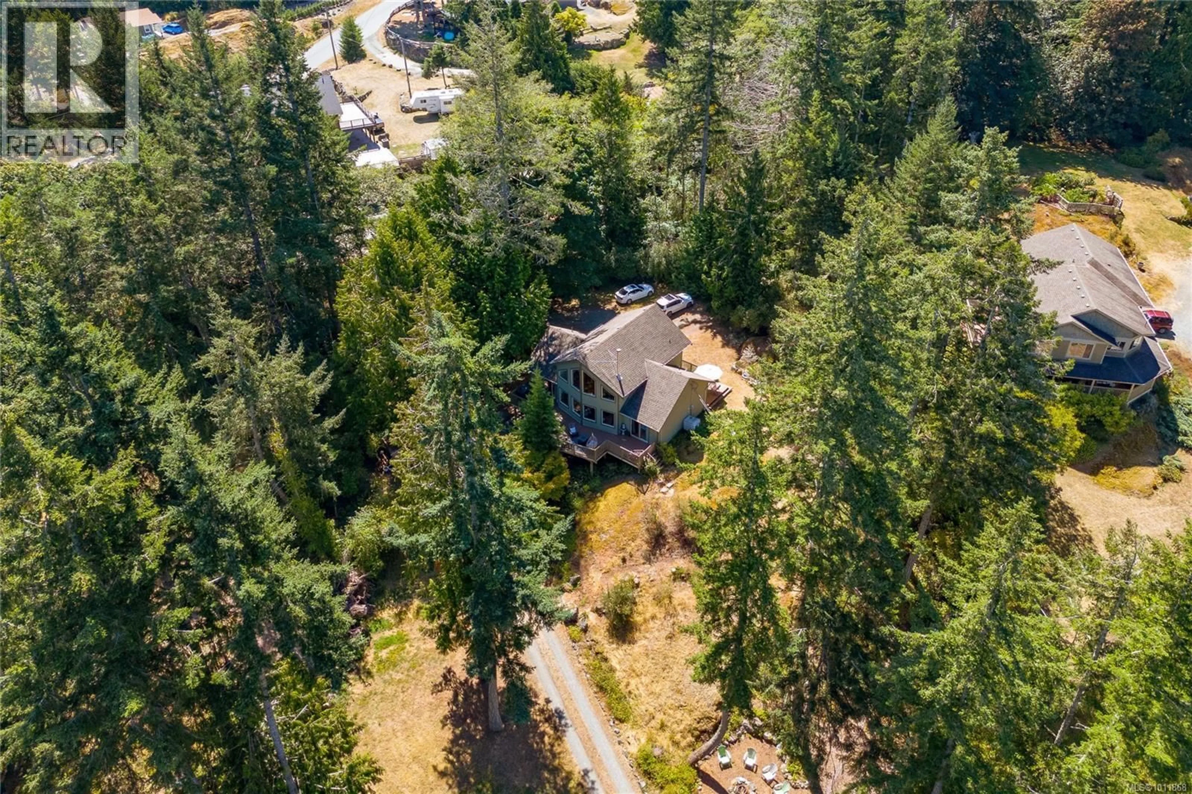 A pic from outside/outdoor area/front of a property/back of a property/a pic from drone, forest/trees view for 1607 COVEY RUN ROAD, Sooke British Columbia V9Z1A1