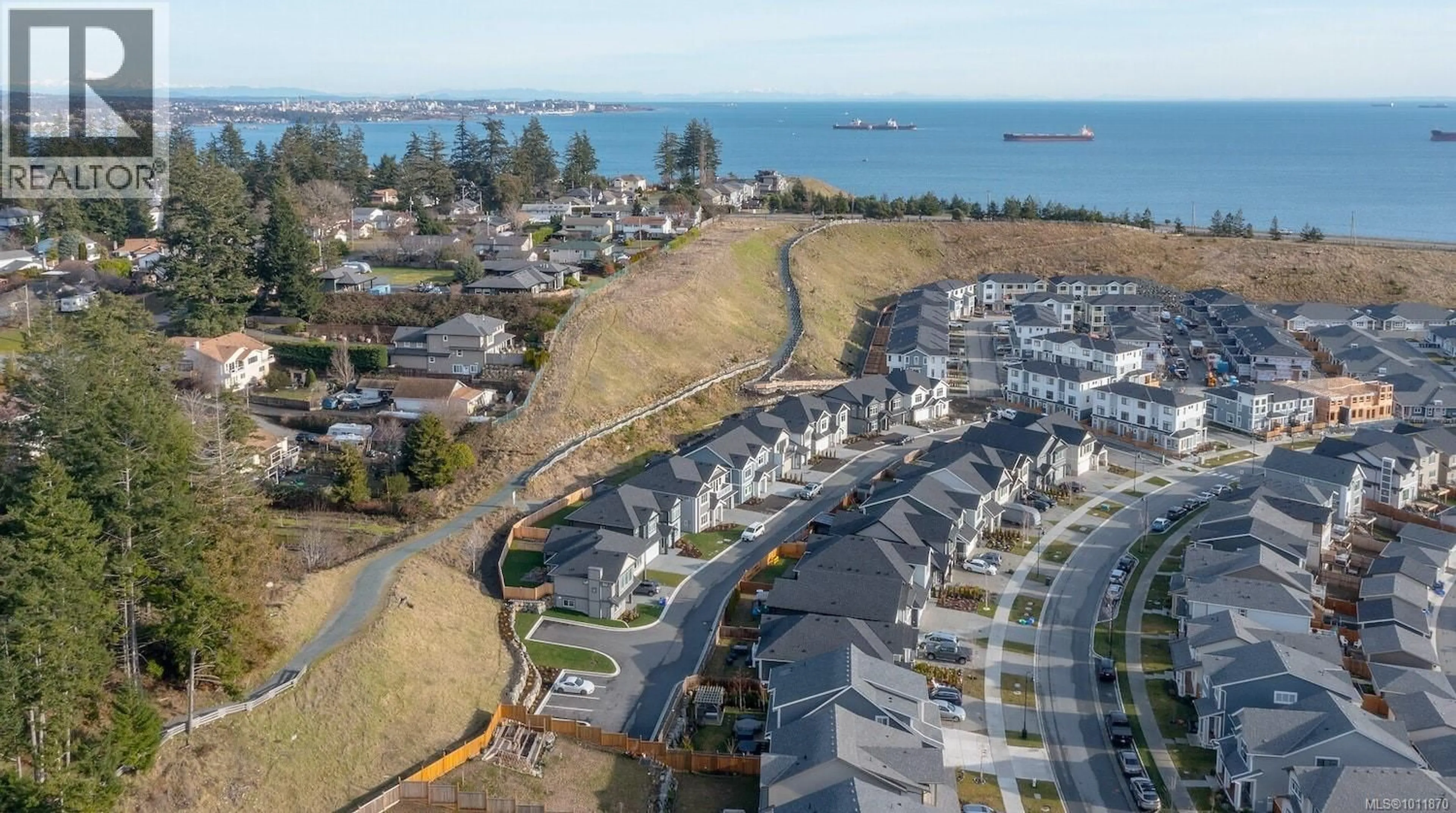 A pic from outside/outdoor area/front of a property/back of a property/a pic from drone, mountain view for 364 TIDELINE LANE, Colwood British Columbia V9C0P8