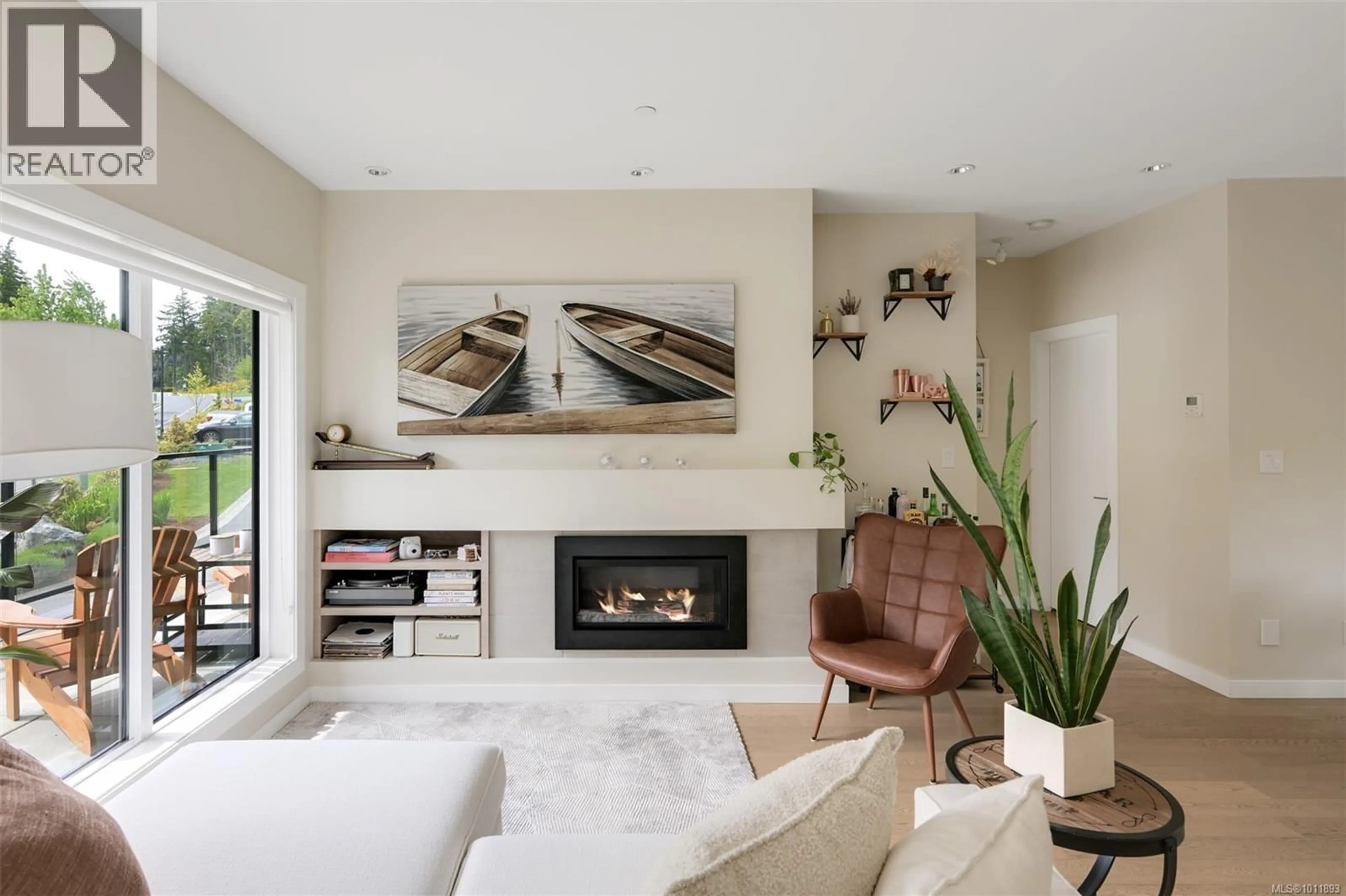 Living room with furniture, unknown for 104 - 1454 BEAR MOUNTAIN PARKWAY, Langford British Columbia V9B0V5