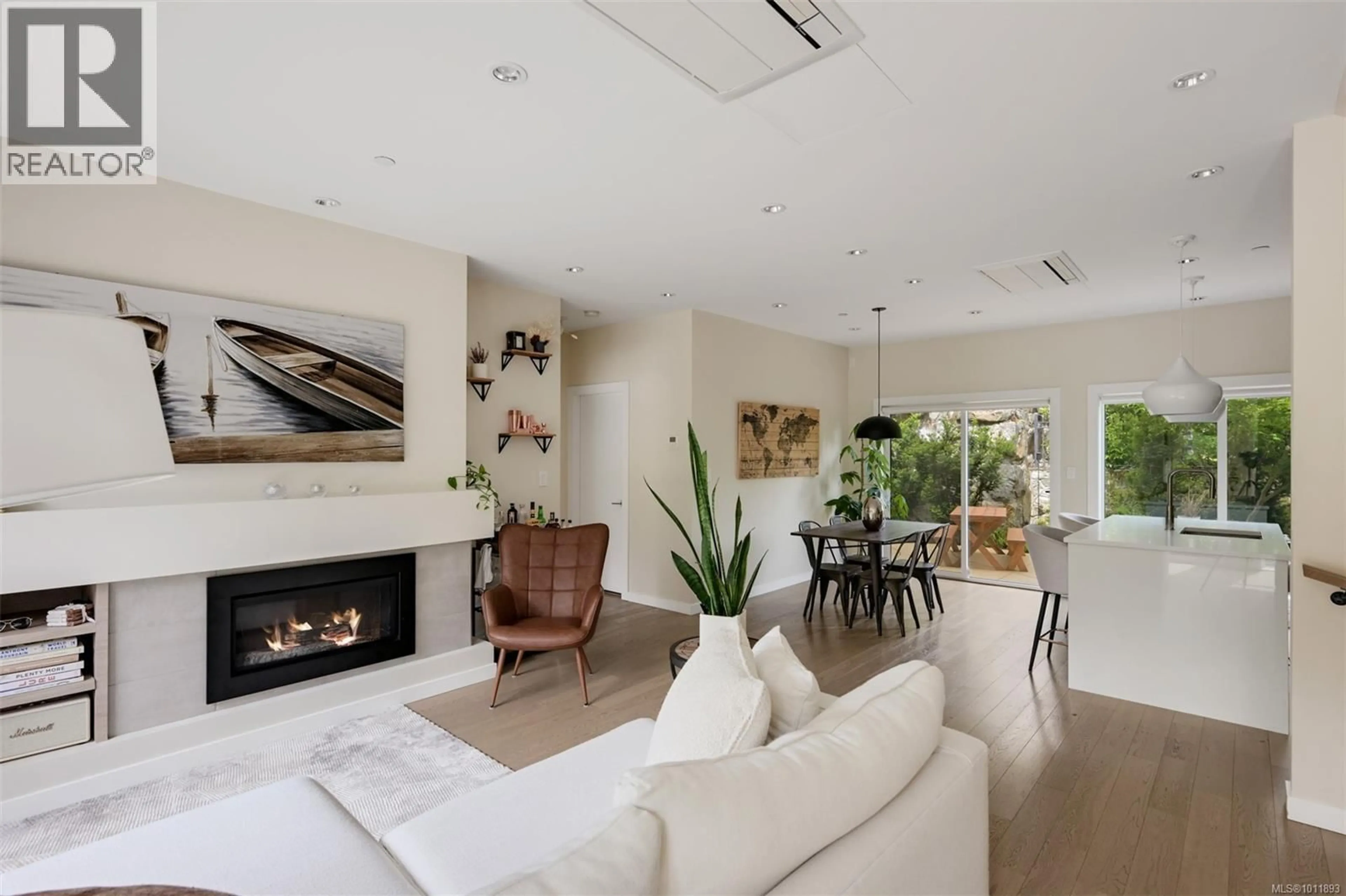 Living room with furniture, unknown for 104 - 1454 BEAR MOUNTAIN PARKWAY, Langford British Columbia V9B0V5
