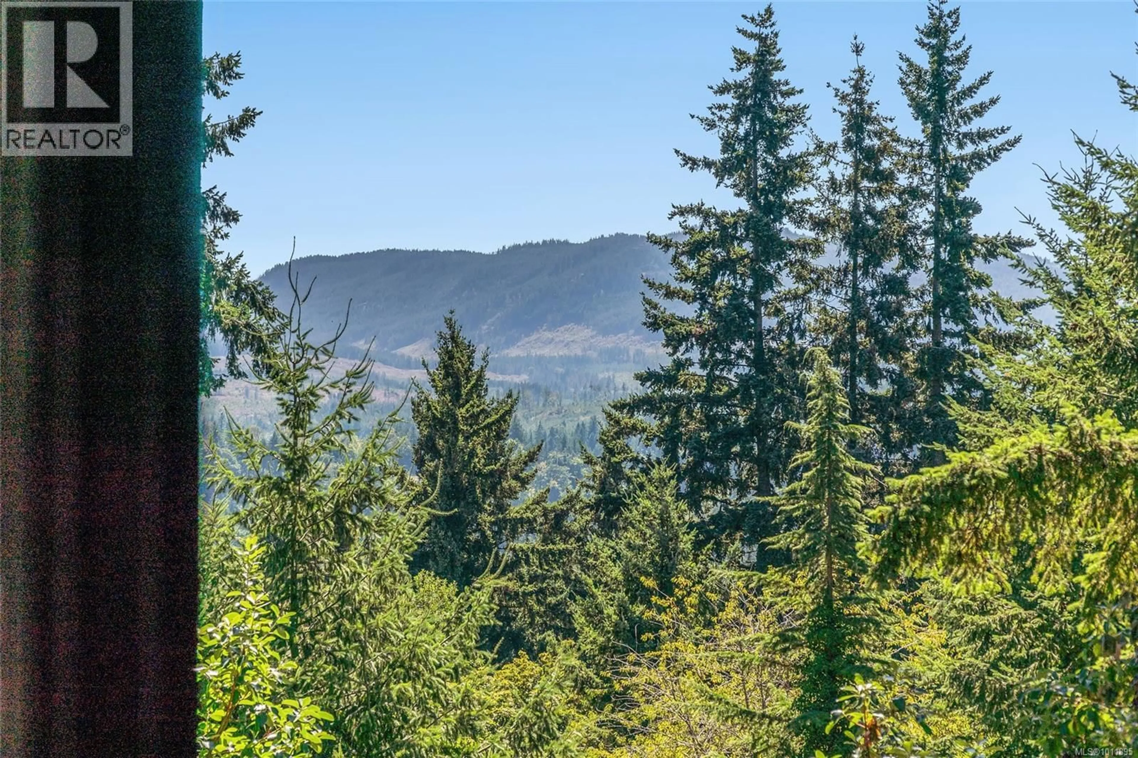 A pic from outside/outdoor area/front of a property/back of a property/a pic from drone, forest/trees view for 2365 ARMSTRONG CRESCENT, Nanoose Bay British Columbia V9P9E6