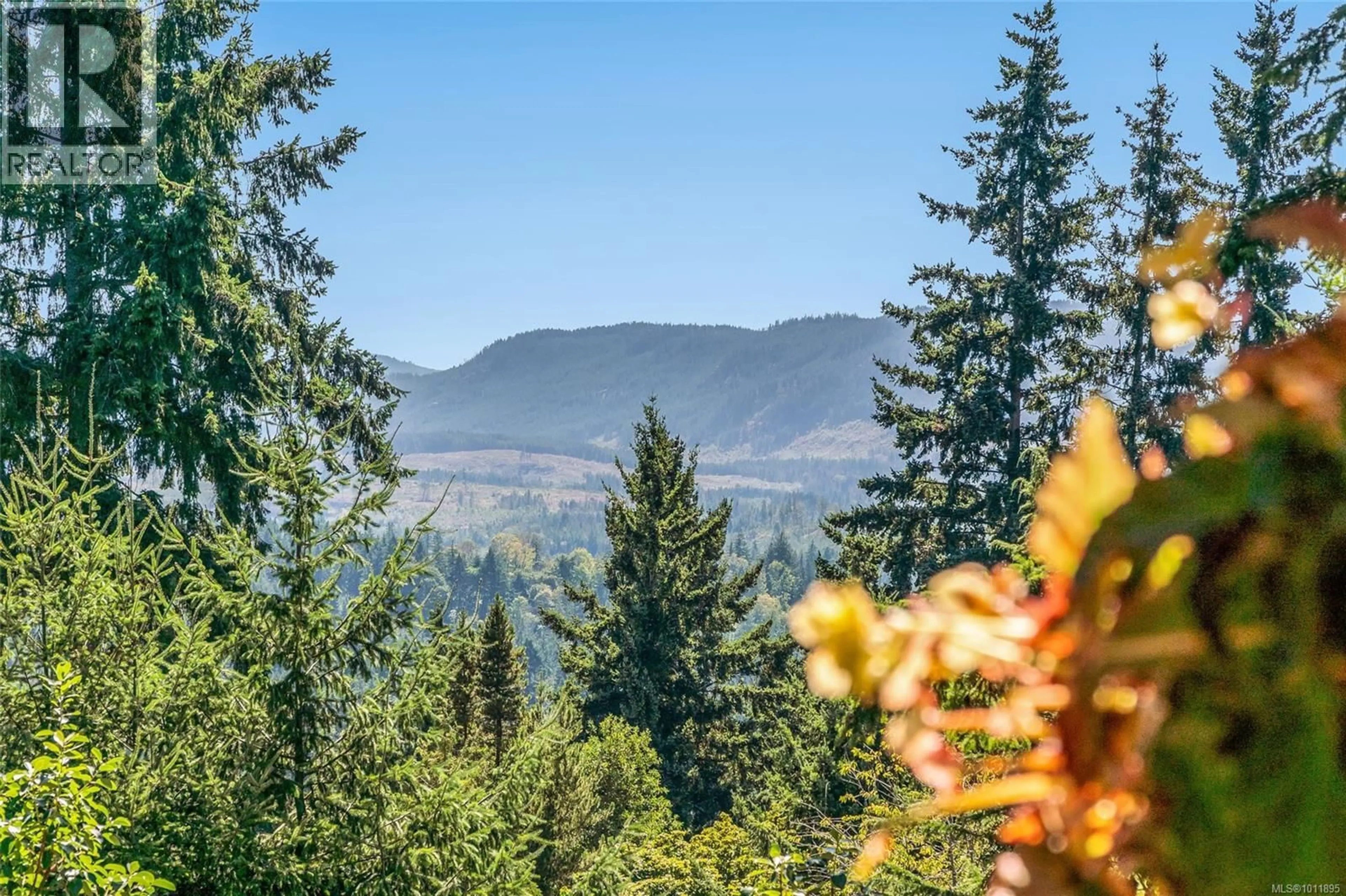 A pic from outside/outdoor area/front of a property/back of a property/a pic from drone, forest/trees view for 2365 ARMSTRONG CRESCENT, Nanoose Bay British Columbia V9P9E6