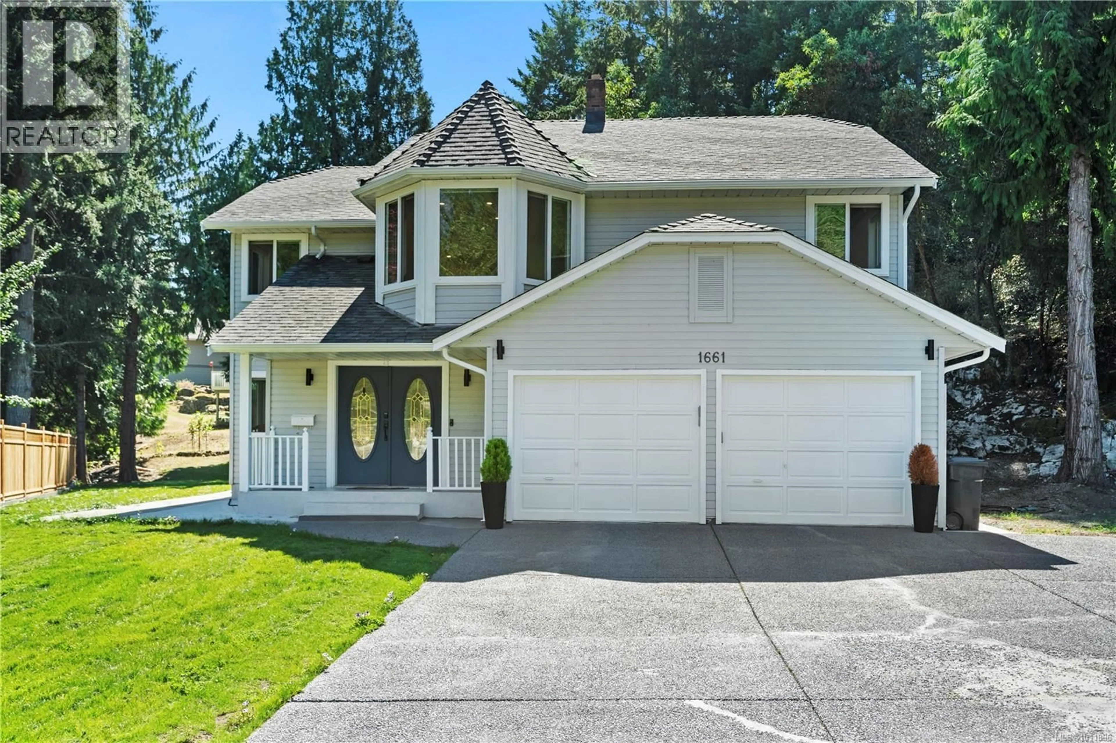 Home with vinyl exterior material, street for 1661 BARRETT DRIVE, North Saanich British Columbia V8L4Z1