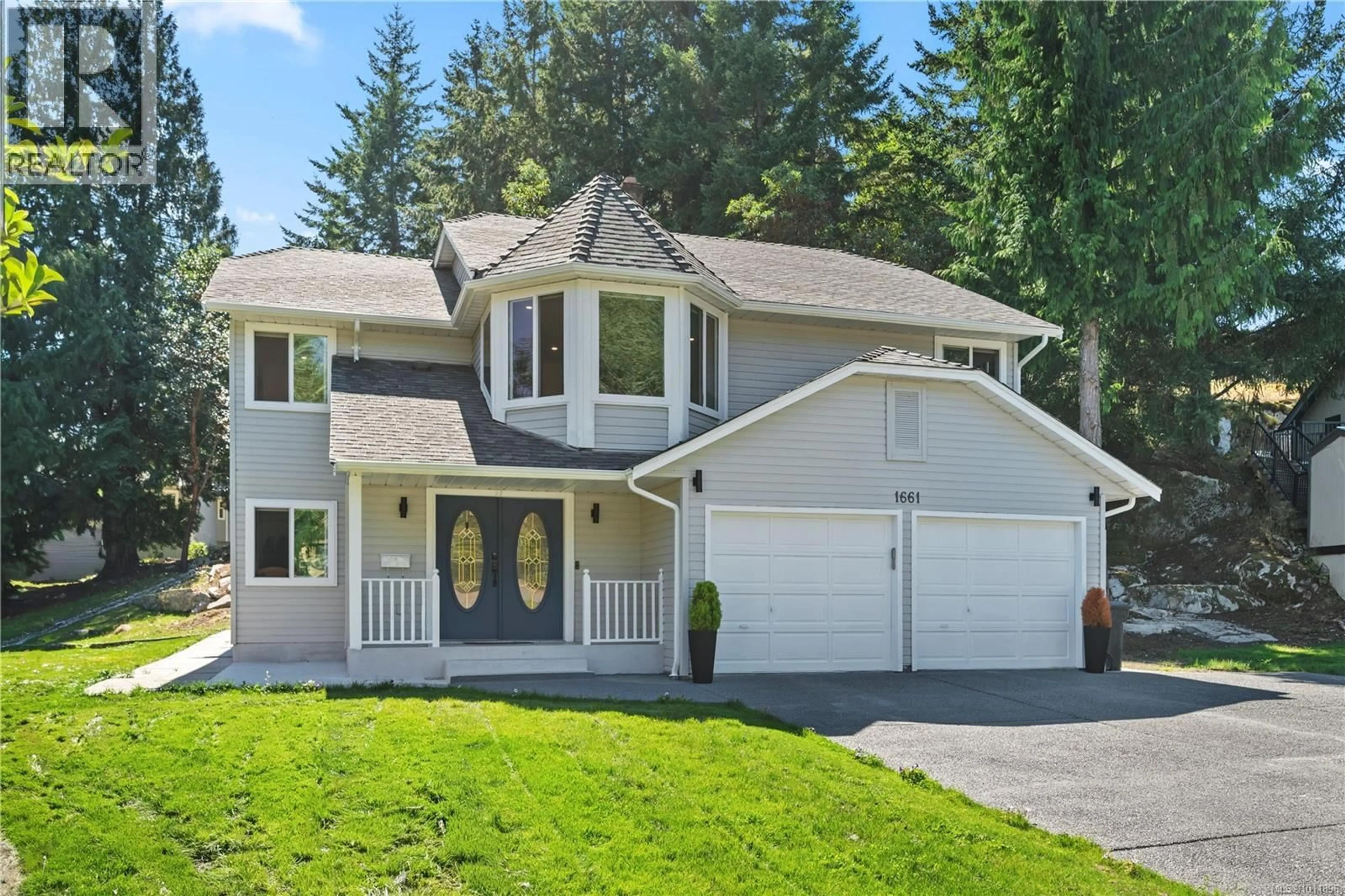 Home with vinyl exterior material, street for 1661 BARRETT DRIVE, North Saanich British Columbia V8L4Z1