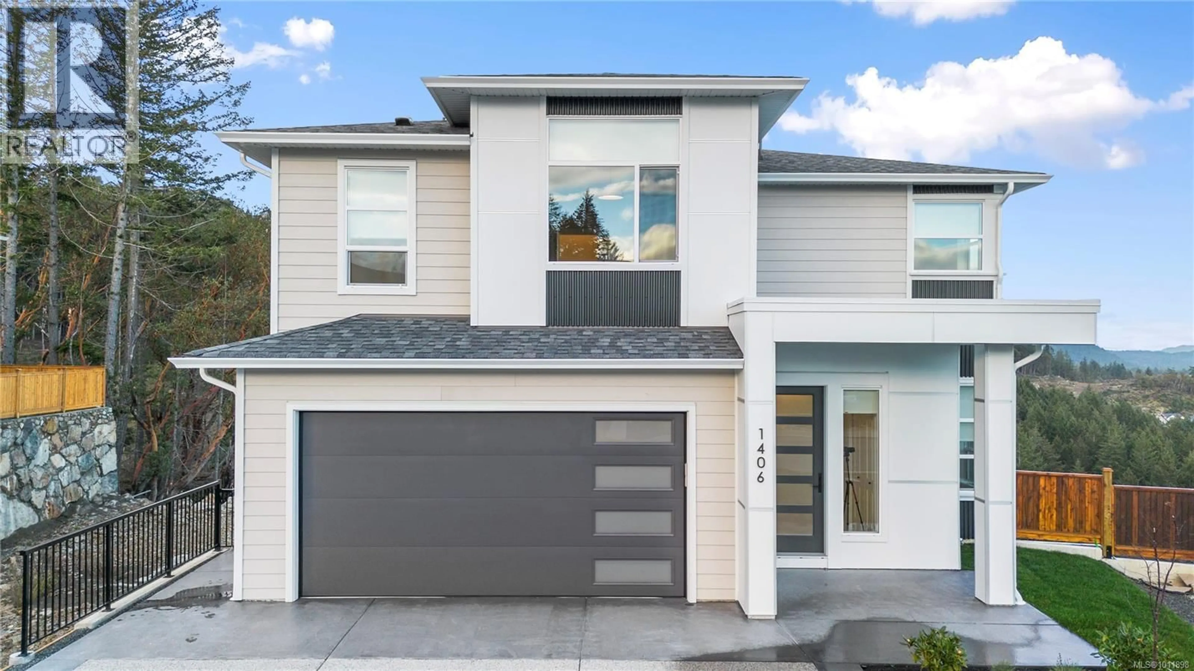 Home with vinyl exterior material, street for 1406 SANDSTONE LANE, Langford British Columbia V9B7A2