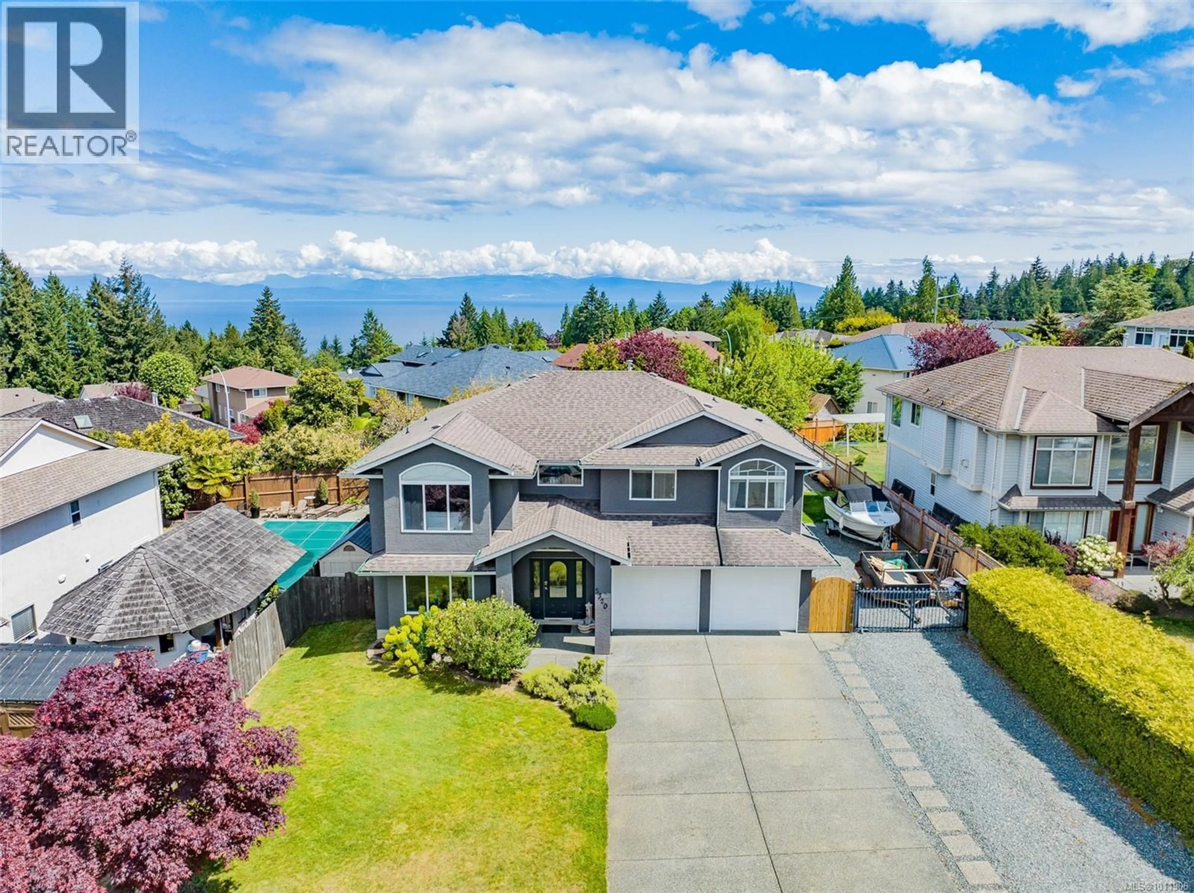 A pic from outside/outdoor area/front of a property/back of a property/a pic from drone, water/lake/river/ocean view for 5320 KENWILL DRIVE, Nanaimo British Columbia V9T5Z8