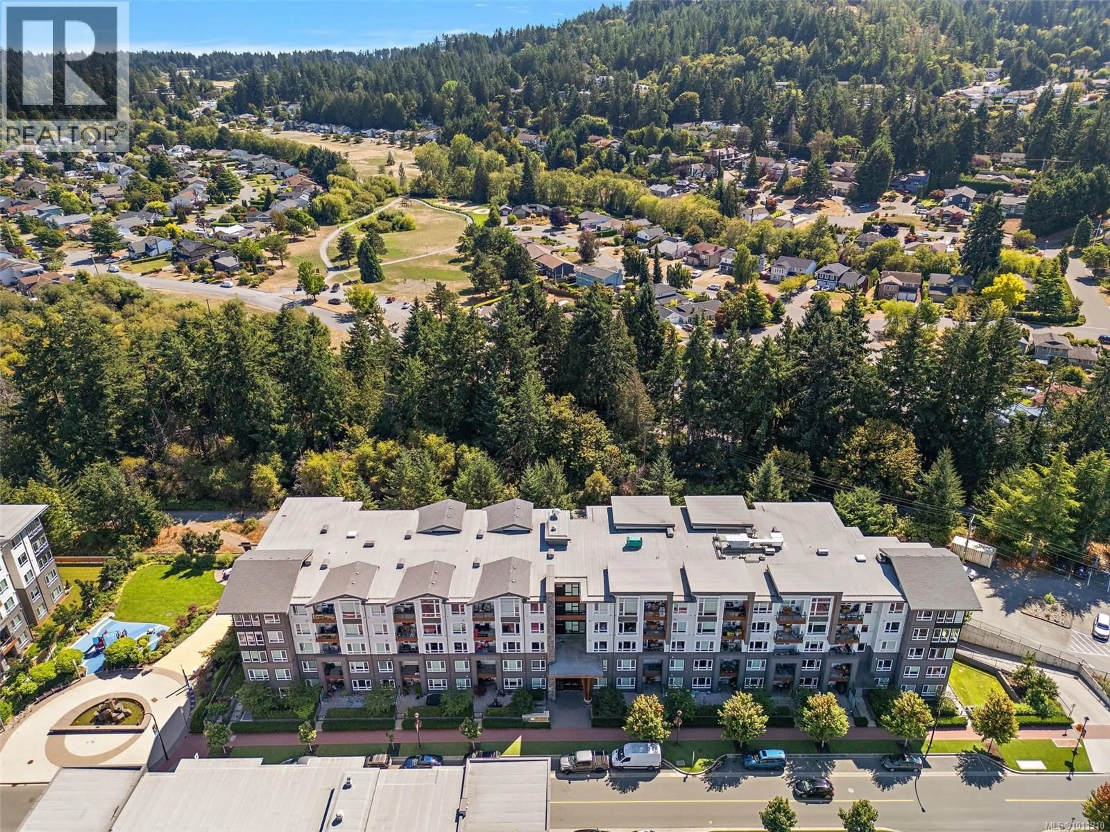 A pic from outside/outdoor area/front of a property/back of a property/a pic from drone, mountain view for 418 - 960 REUNION AVENUE, Langford British Columbia V9B0W5