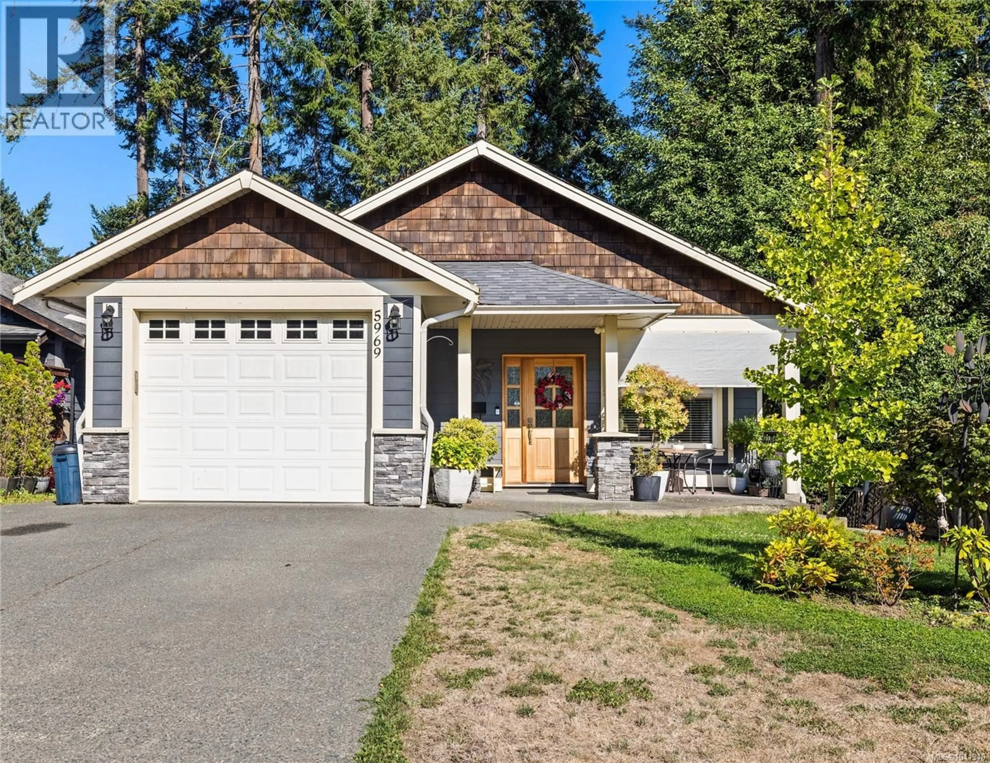 Home with vinyl exterior material, street for 5969 STONEHAVEN DRIVE, Duncan British Columbia V9L0A1