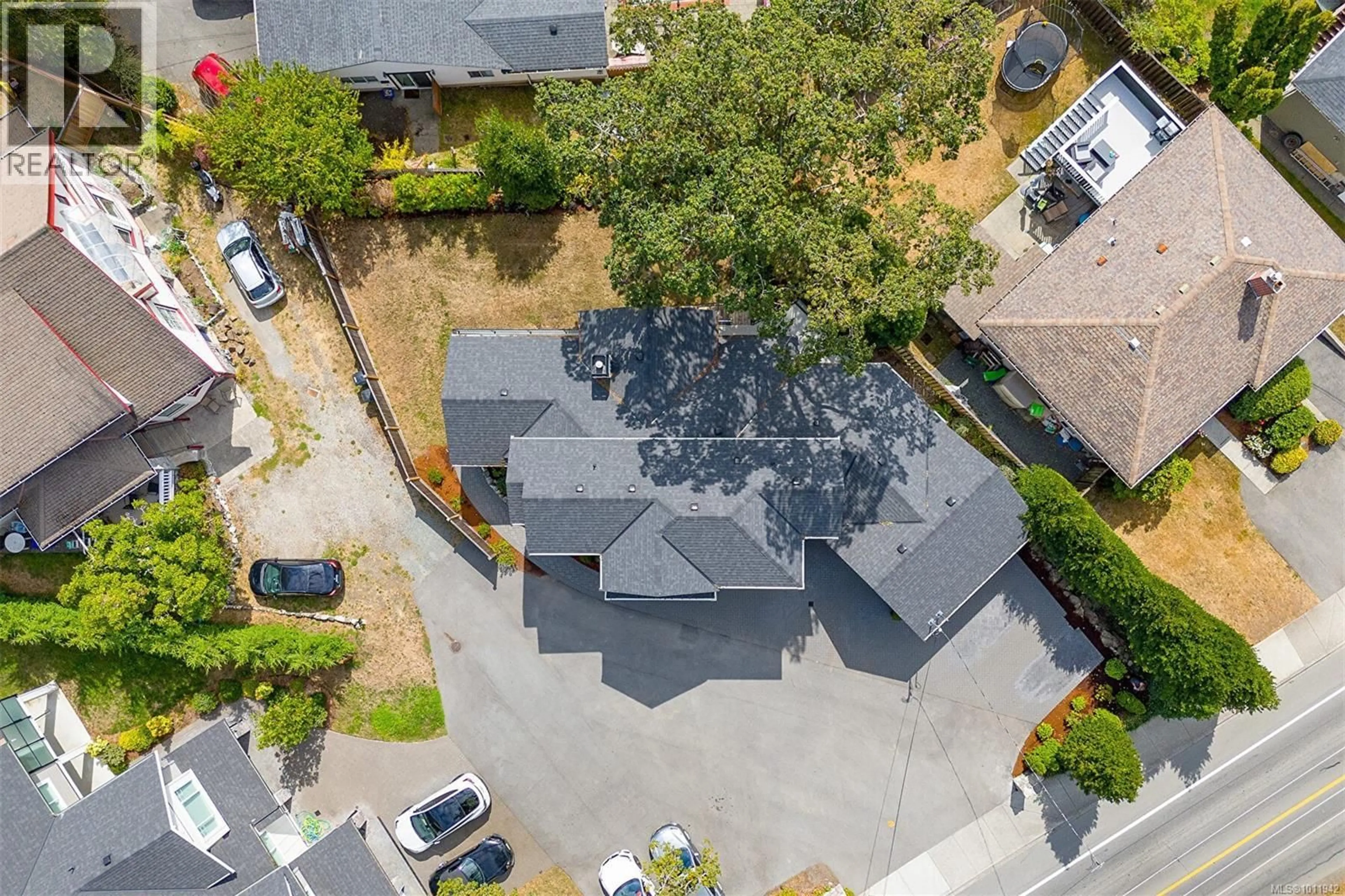 A pic from outside/outdoor area/front of a property/back of a property/a pic from drone, street for 3595 CEDAR HILL ROAD, Saanich British Columbia V8P3Z1