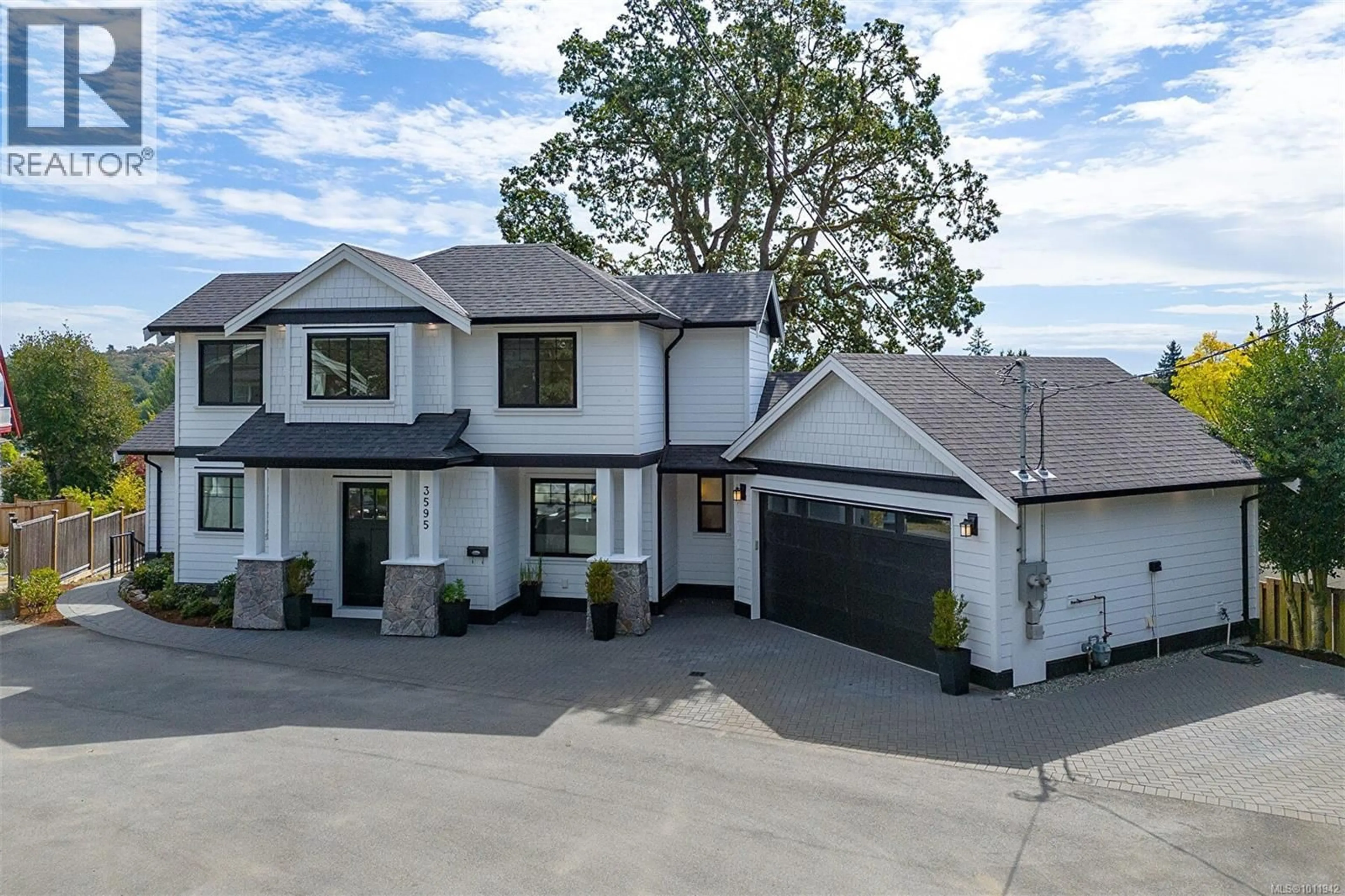 A pic from outside/outdoor area/front of a property/back of a property/a pic from drone, street for 3595 CEDAR HILL ROAD, Saanich British Columbia V8P3Z1