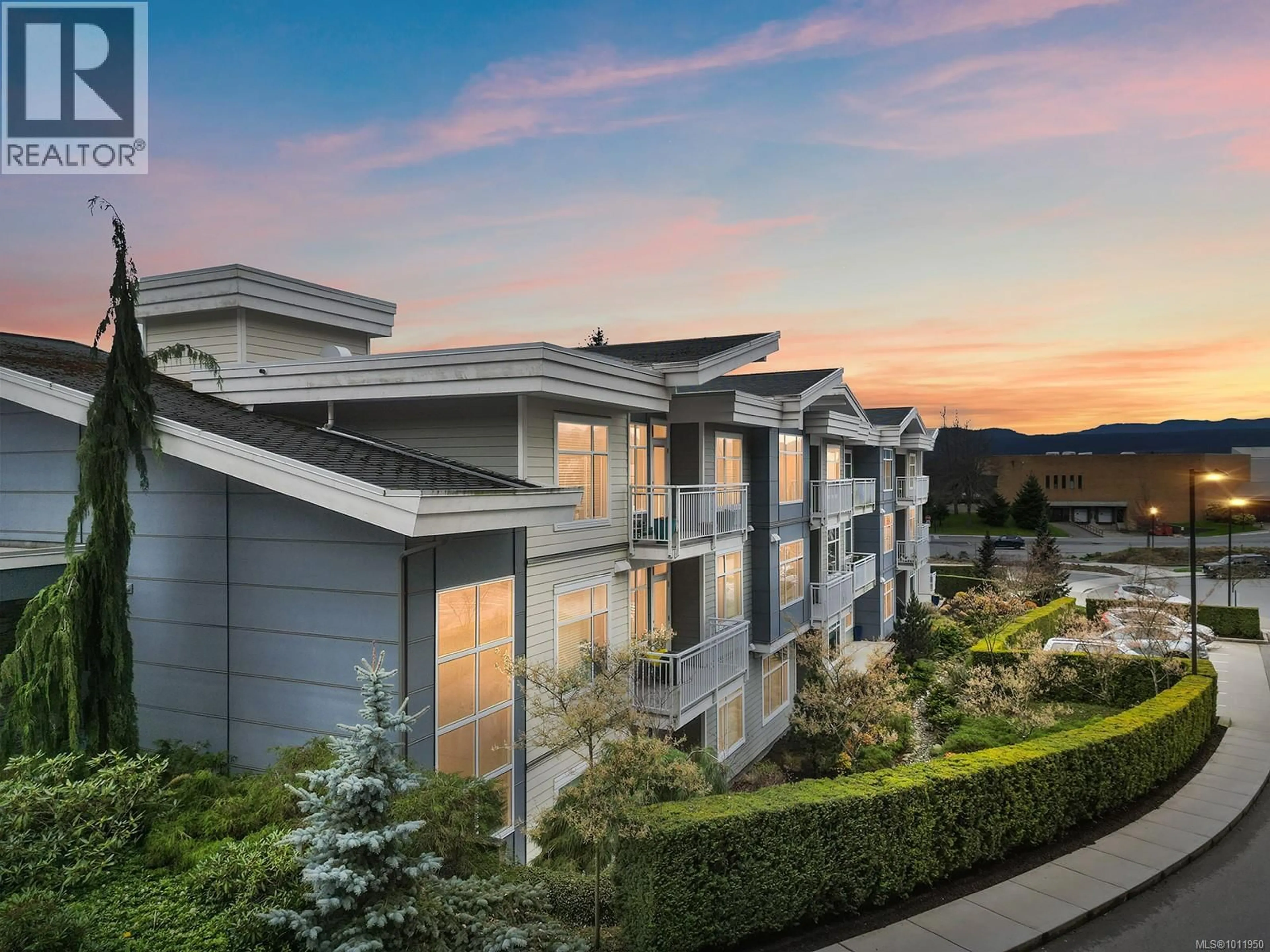 A pic from outside/outdoor area/front of a property/back of a property/a pic from drone, mountain view for 213 - 4960 SONGBIRD PLACE, Nanaimo British Columbia V9T0H7