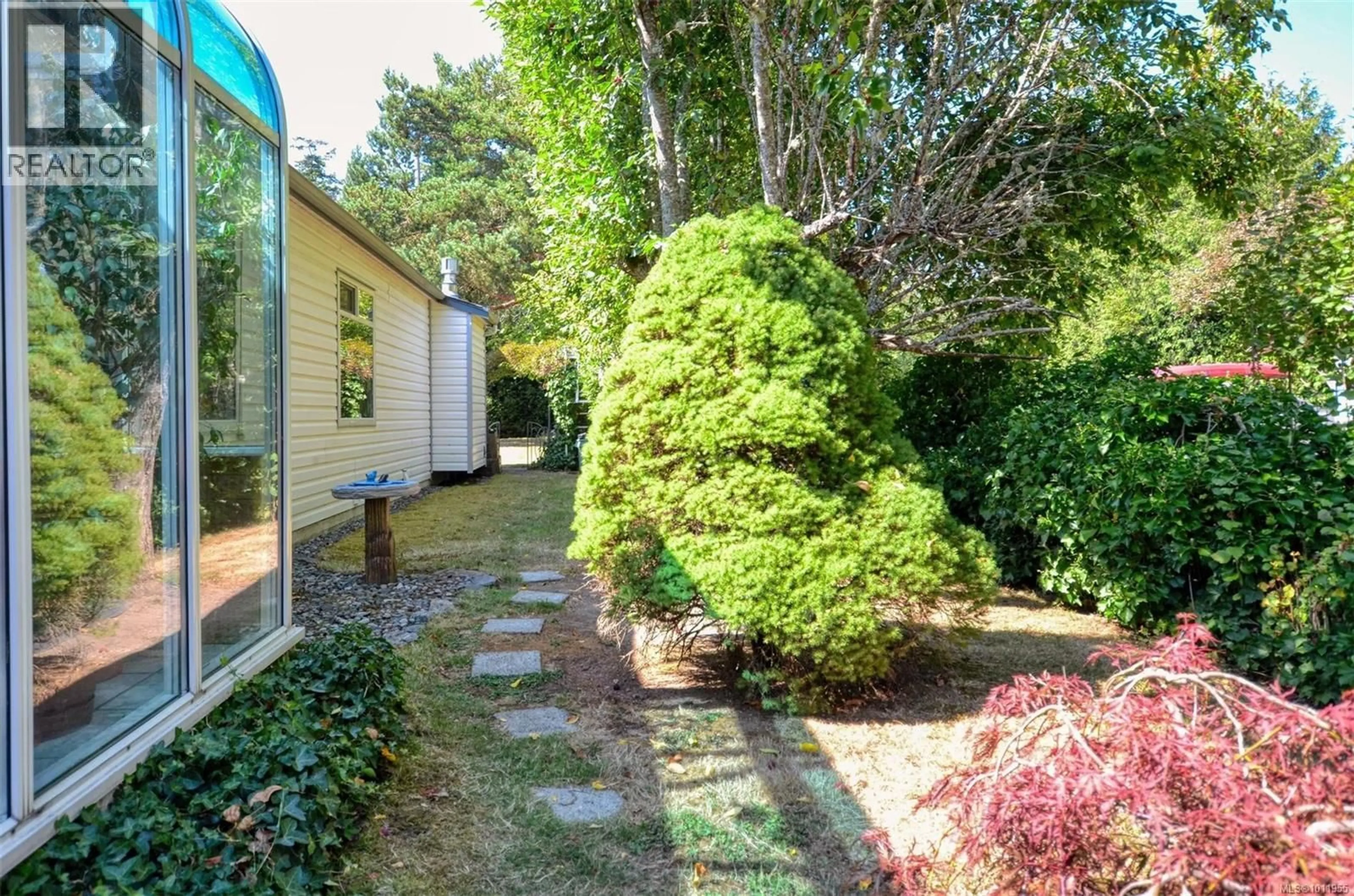 A pic from outside/outdoor area/front of a property/back of a property/a pic from drone, street for 10561 MCDONALD PARK ROAD, Sidney British Columbia V8L3J3