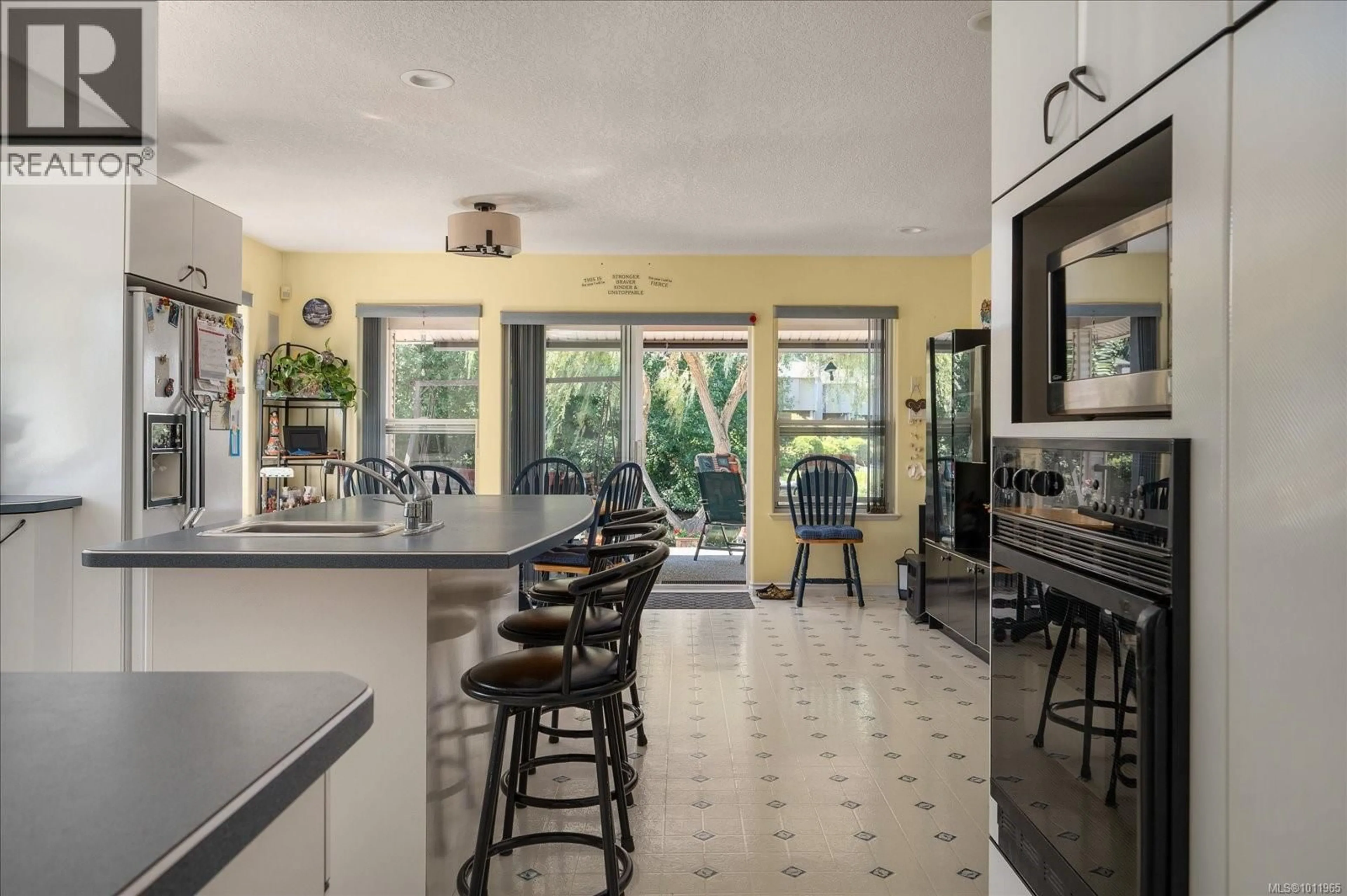 Open concept kitchen, ceramic/tile floor for 530 DALMATIAN DRIVE, French Creek British Columbia V9P1Y4