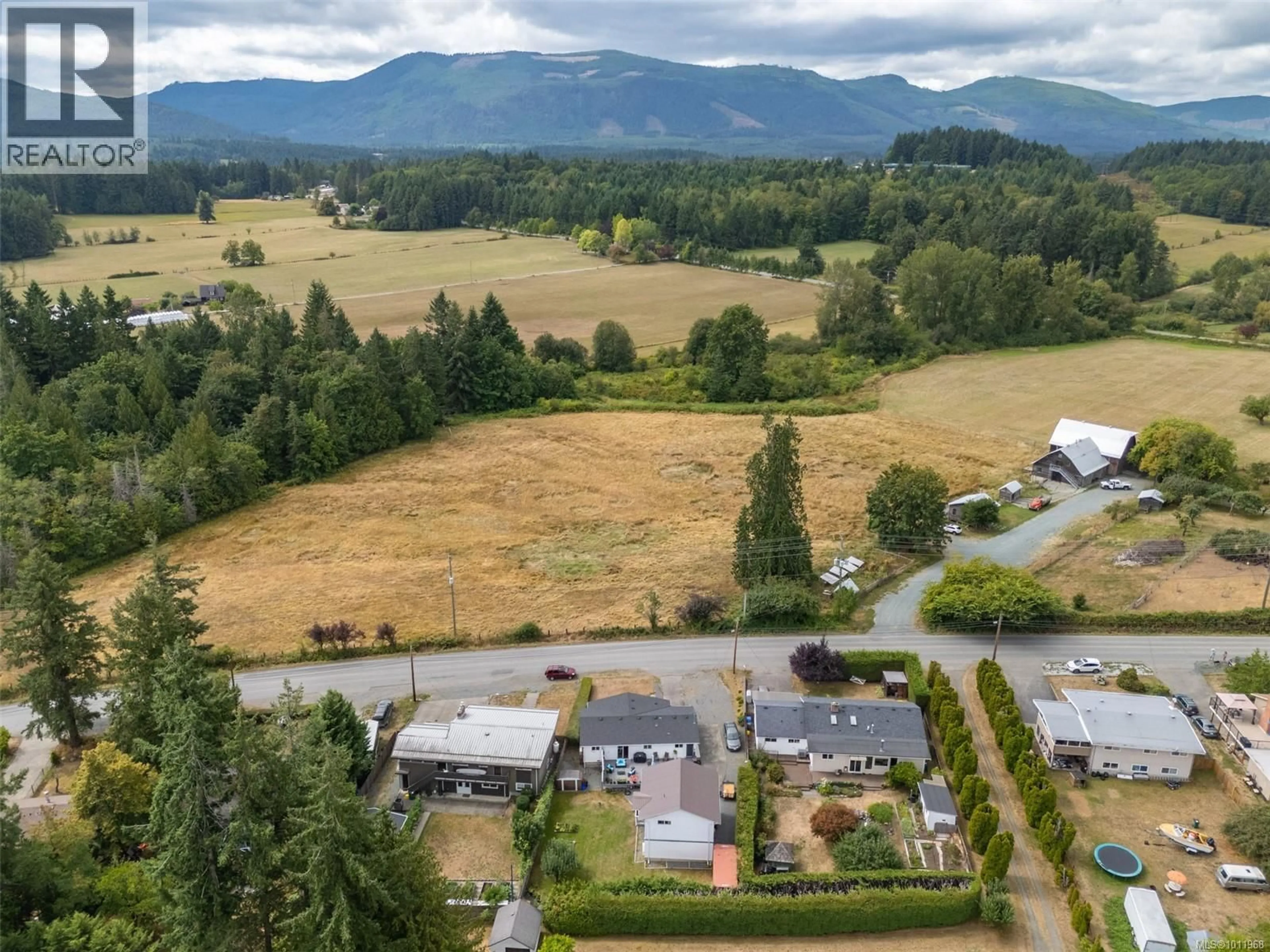 A pic from outside/outdoor area/front of a property/back of a property/a pic from drone, mountain view for 5219 MILLER ROAD, Duncan British Columbia V9L6V7