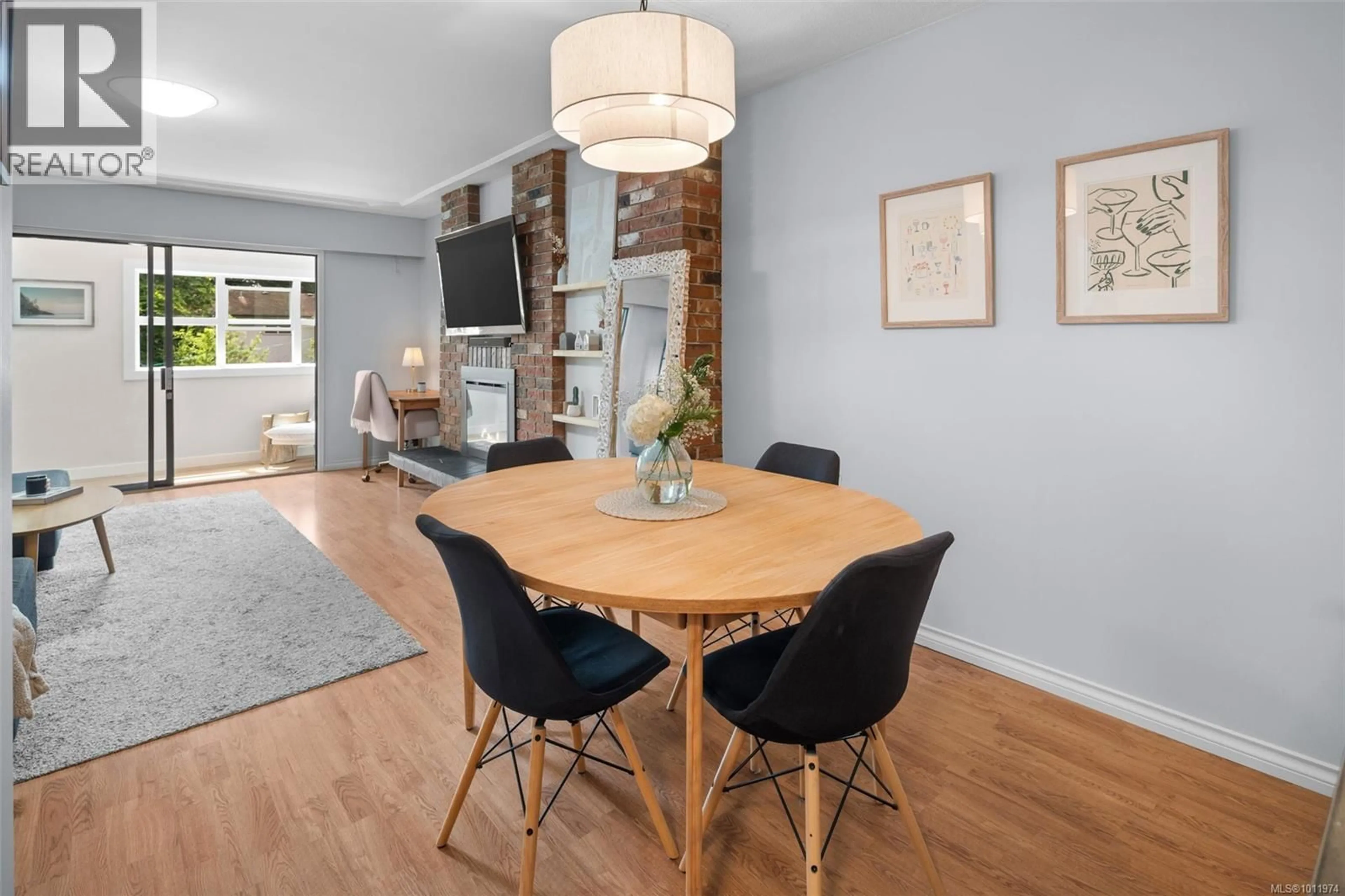 Dining room, wood/laminate floor for 203 - 3244 SEATON STREET, Saanich British Columbia V8Z3V7