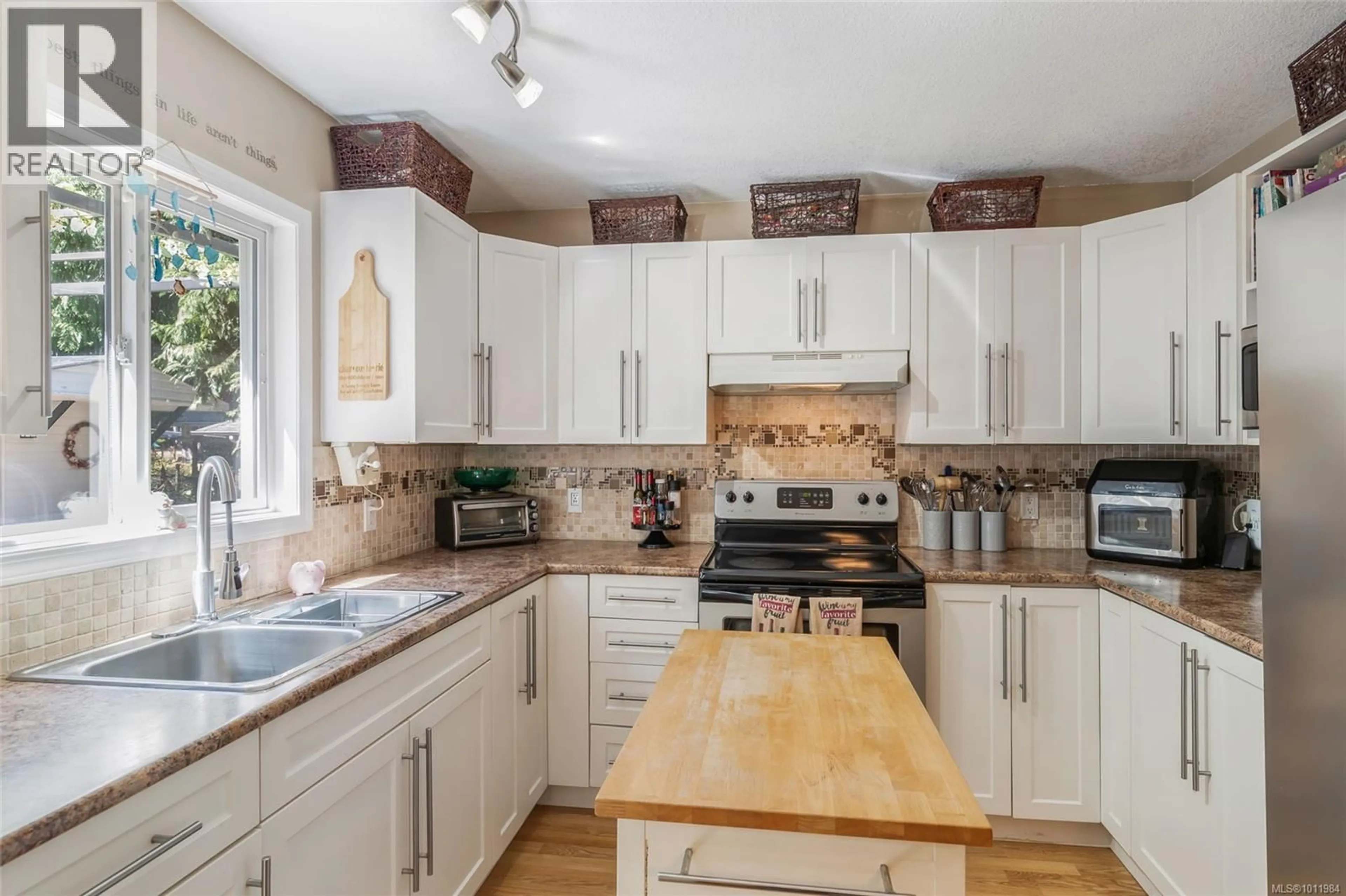 Open concept kitchen, unknown for 5090 GAINSBERG ROAD, Bowser British Columbia V0R1G0