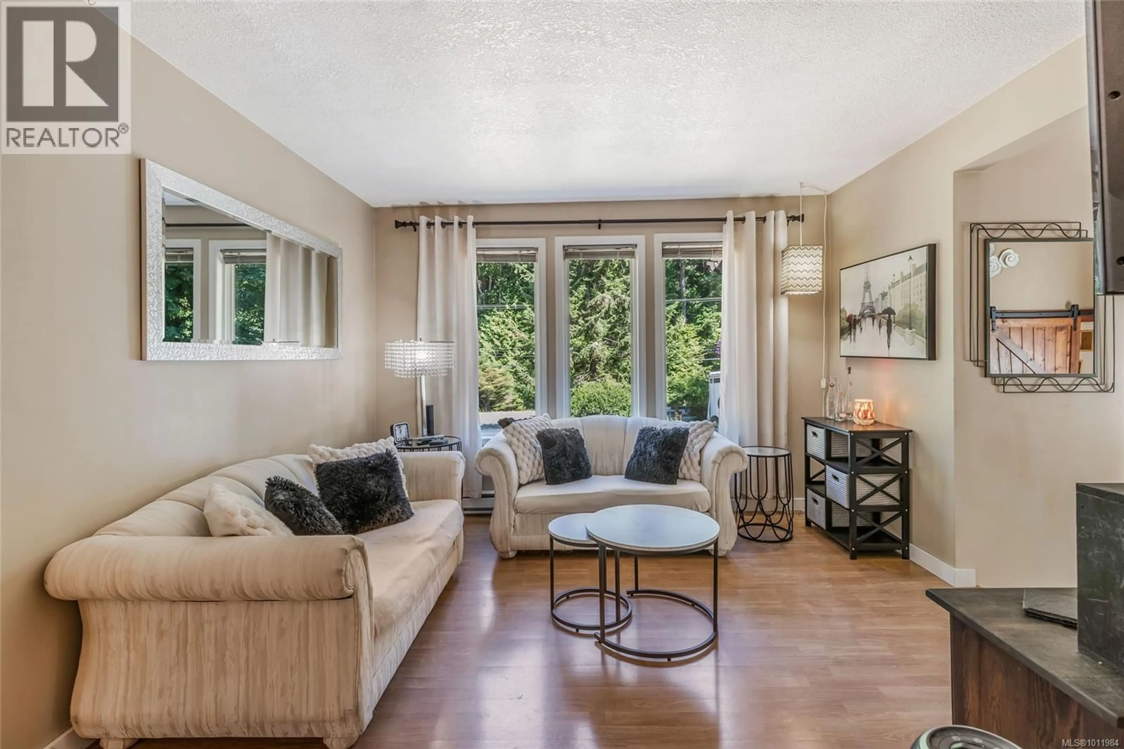 Living room with furniture, unknown for 5090 GAINSBERG ROAD, Bowser British Columbia V0R1G0