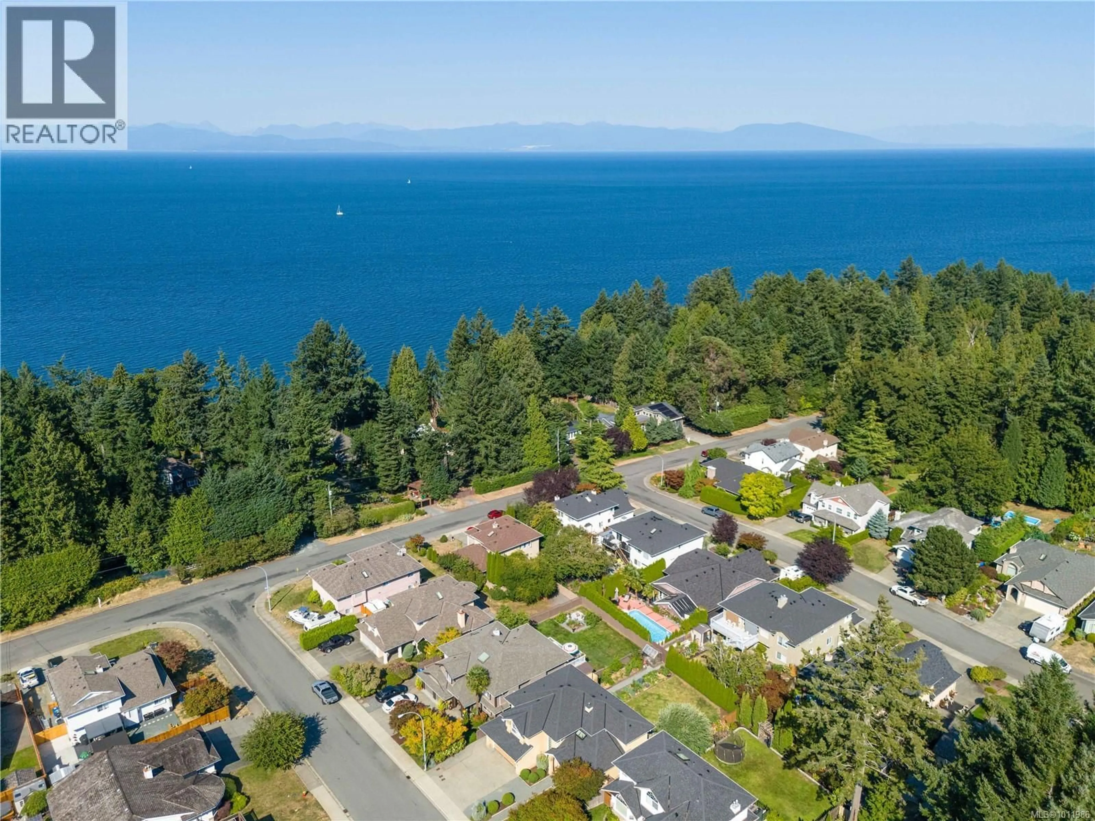 A pic from outside/outdoor area/front of a property/back of a property/a pic from drone, water/lake/river/ocean view for 6262 AZURE ROAD, Nanaimo British Columbia V9V1P1