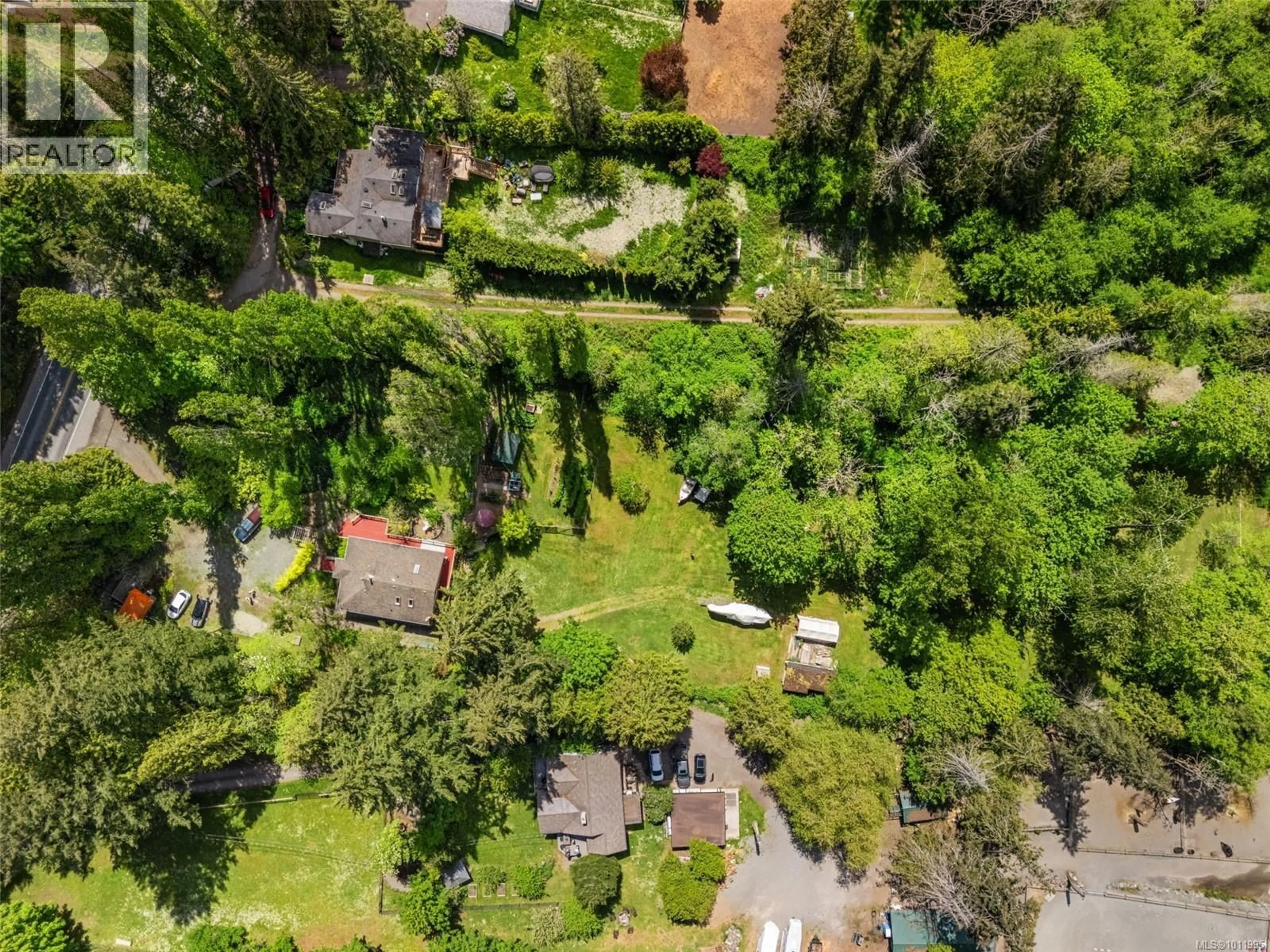 A pic from outside/outdoor area/front of a property/back of a property/a pic from drone, forest/trees view for 5932 WEST SAANICH ROAD, Saanich British Columbia V9E2G4