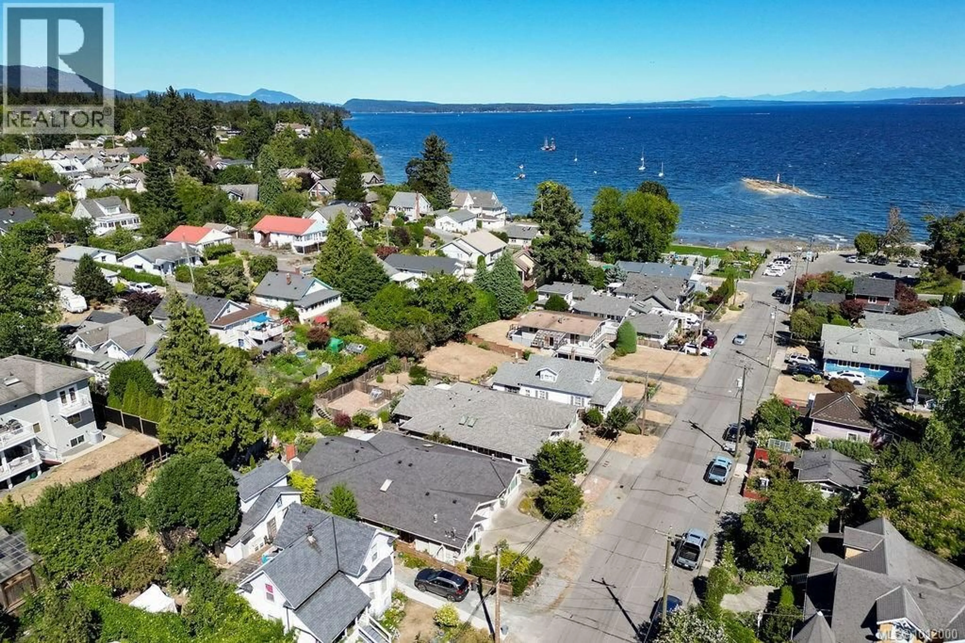 A pic from outside/outdoor area/front of a property/back of a property/a pic from drone, water/lake/river/ocean view for 9906 MAPLE STREET, Chemainus British Columbia V0R1K1