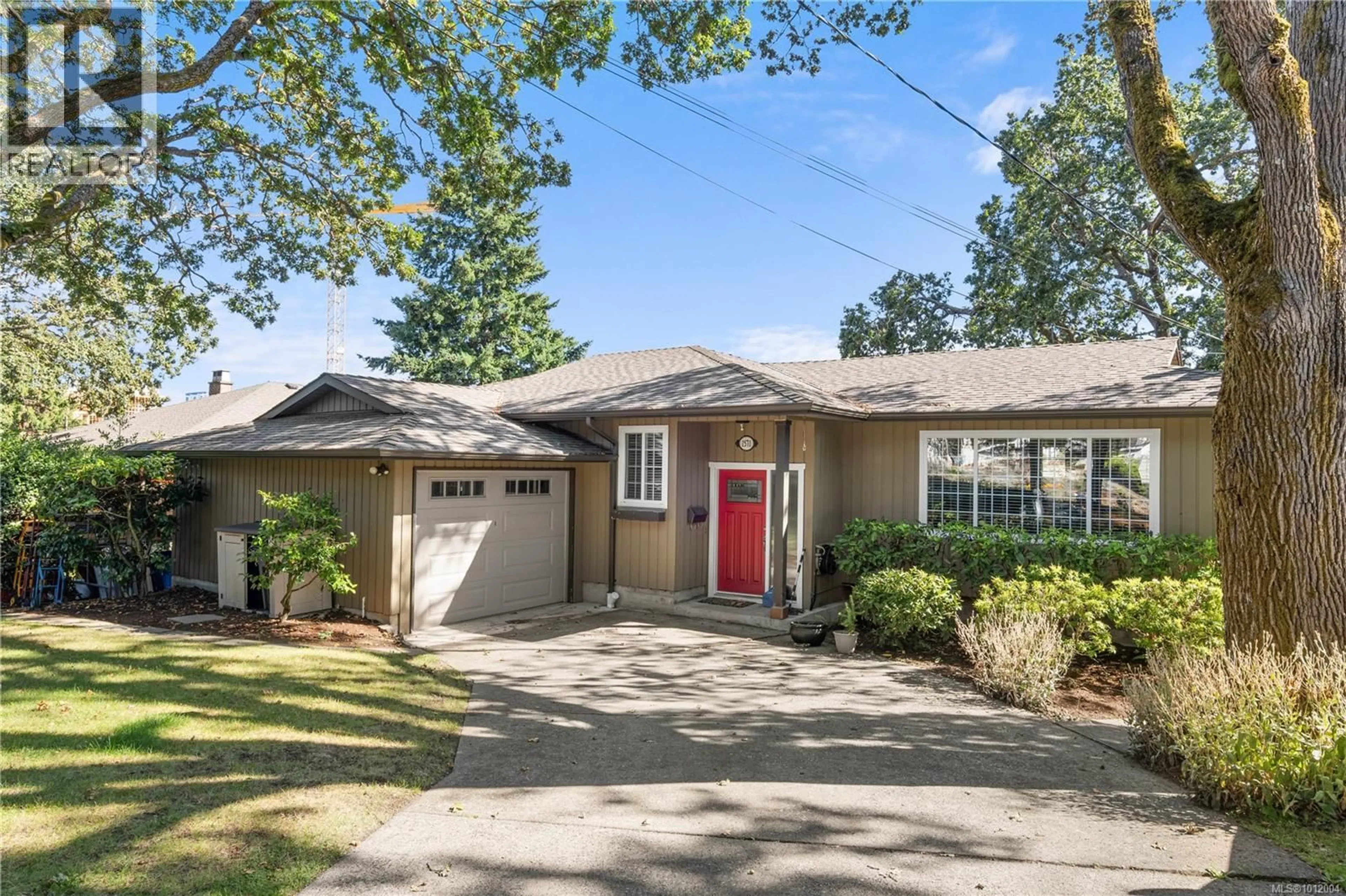 Home with brick exterior material, street for 1571 ARROW ROAD, Saanich British Columbia V8N1C8