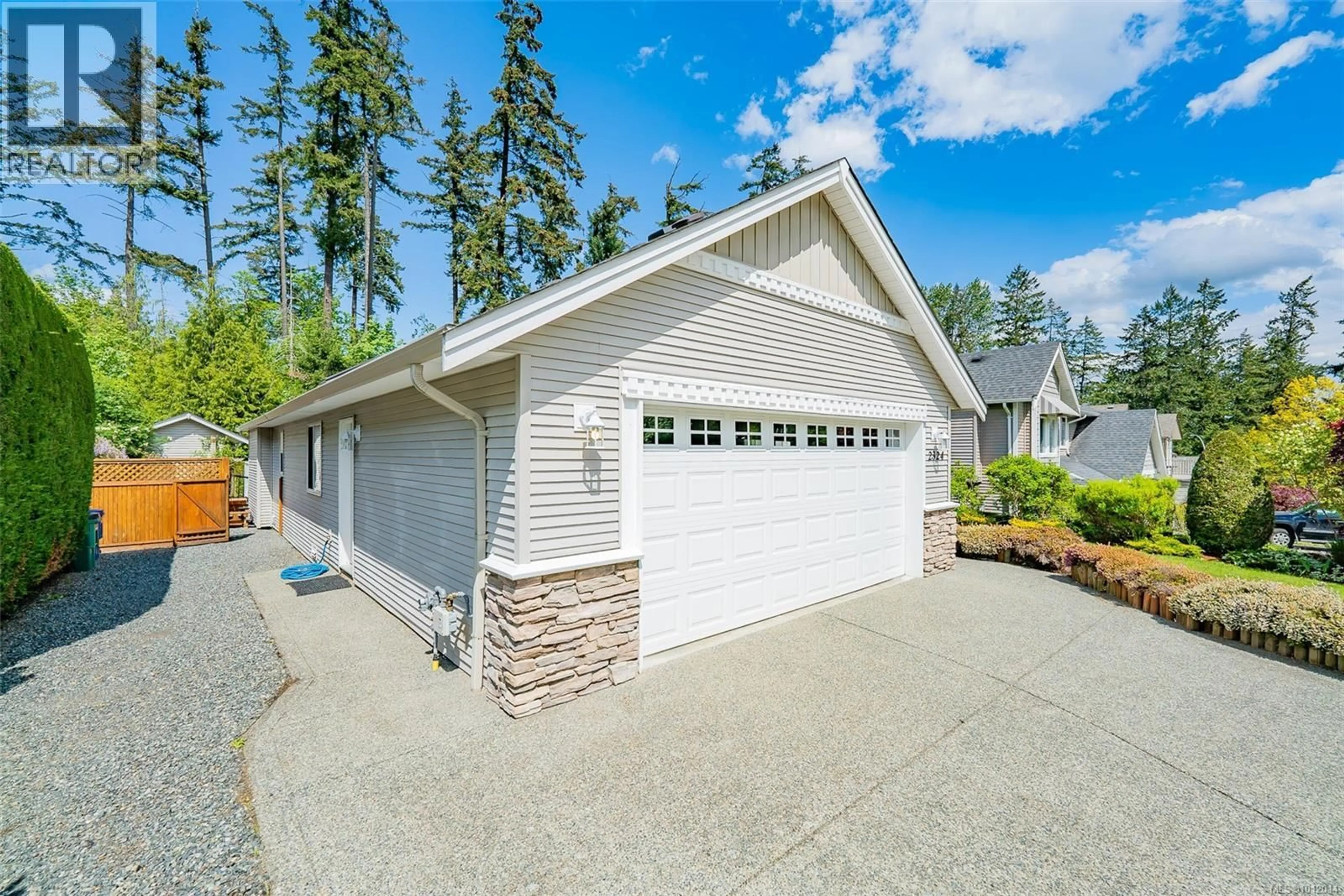 Home with vinyl exterior material, street for 2324 DODDS ROAD, Nanaimo British Columbia V9X1Y3