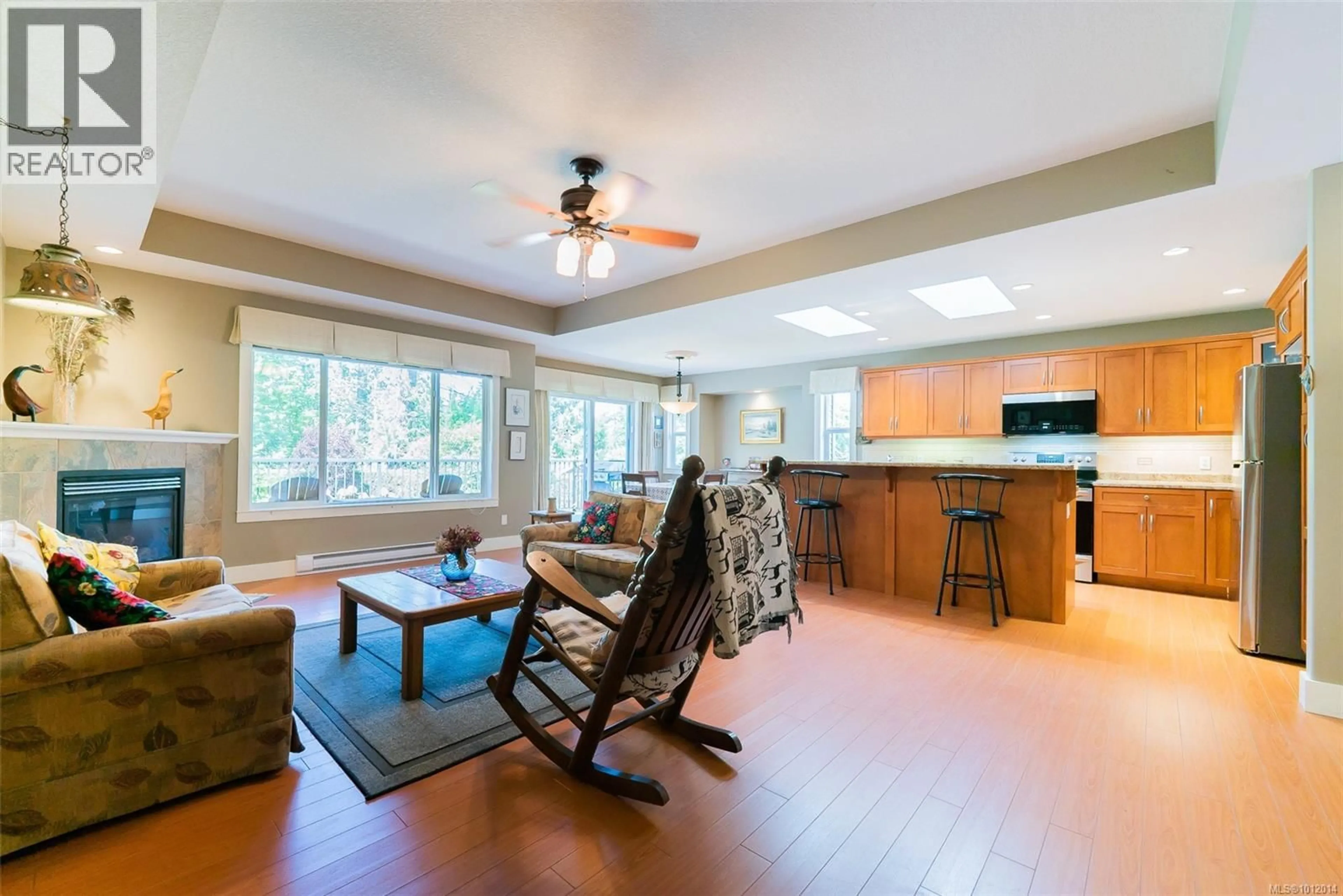 Living room with furniture, wood/laminate floor for 2324 DODDS ROAD, Nanaimo British Columbia V9X1Y3