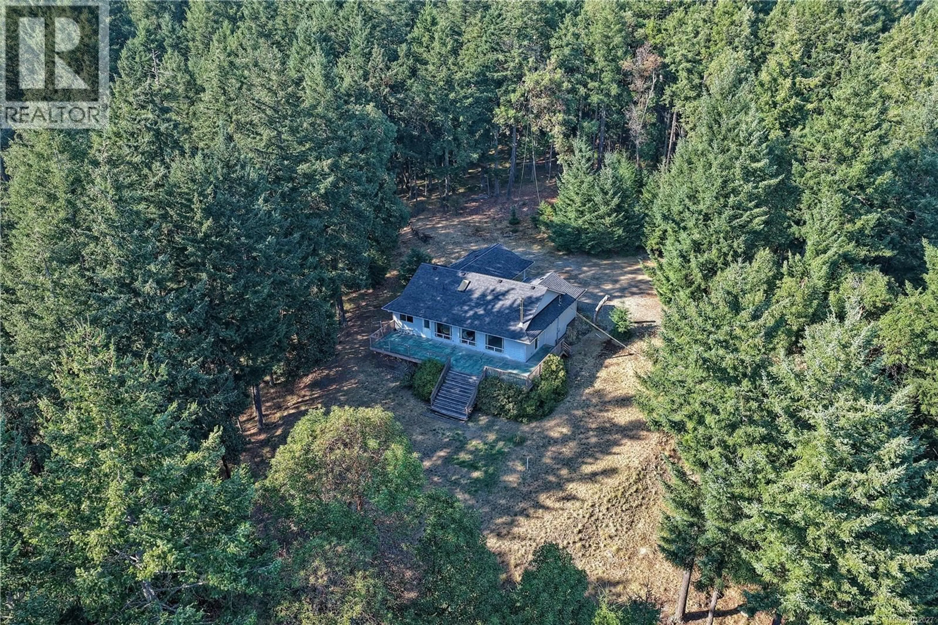 A pic from outside/outdoor area/front of a property/back of a property/a pic from drone, forest/trees view for 229 CORMORANT CRESCENT, Salt Spring British Columbia V8K1G8