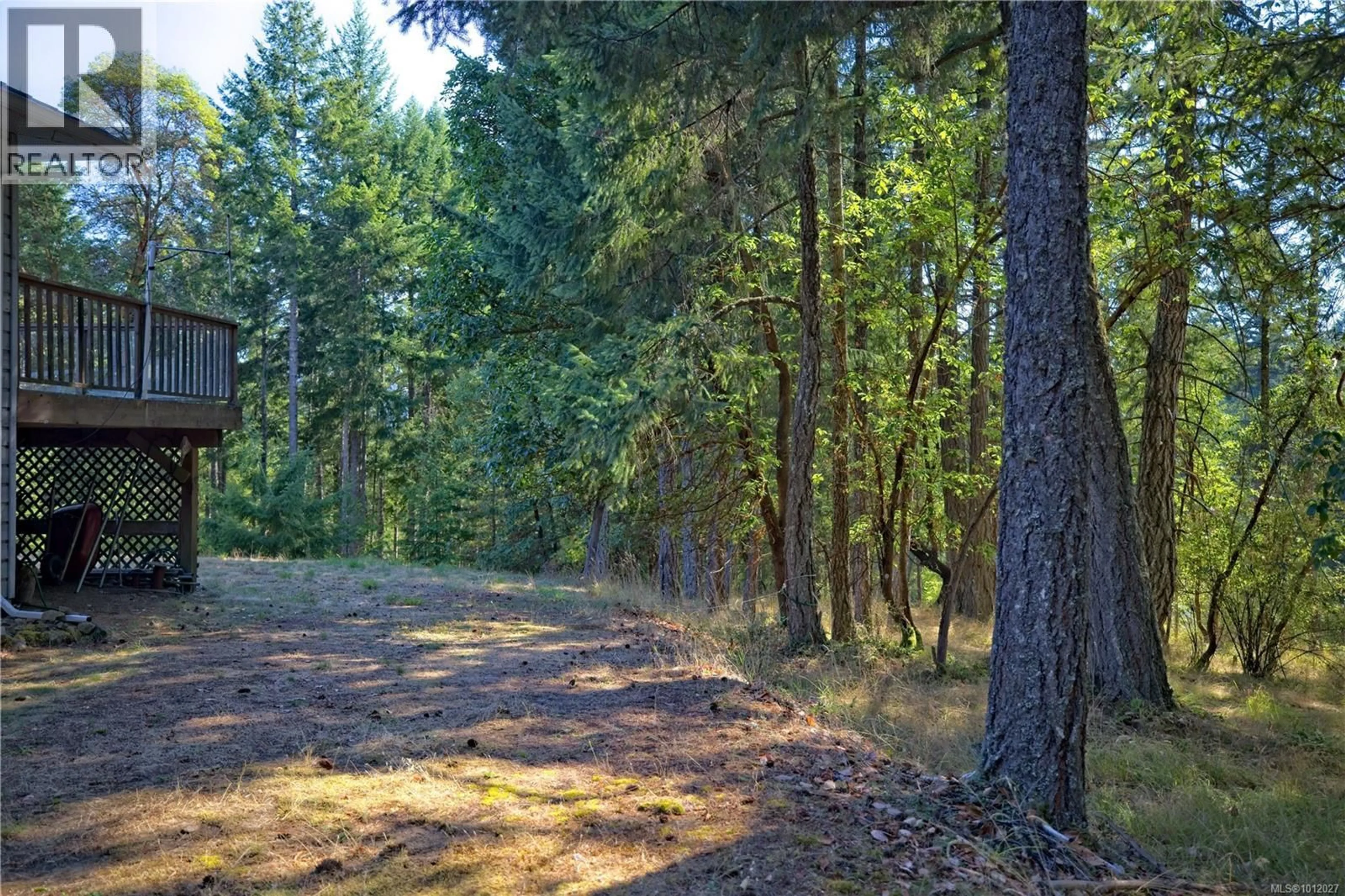 A pic from outside/outdoor area/front of a property/back of a property/a pic from drone, forest/trees view for 229 CORMORANT CRESCENT, Salt Spring British Columbia V8K1G8