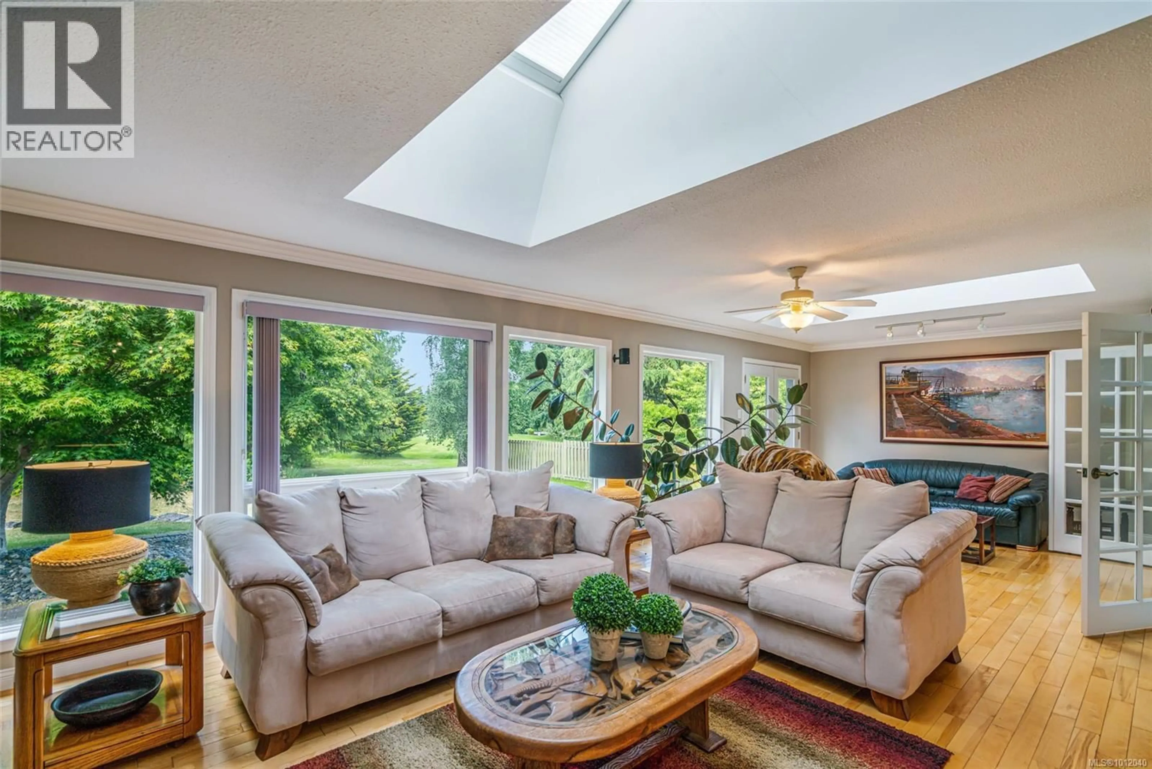 Living room with furniture, unknown for 1023 HARLEQUIN ROAD, Qualicum Beach British Columbia V9K1E2