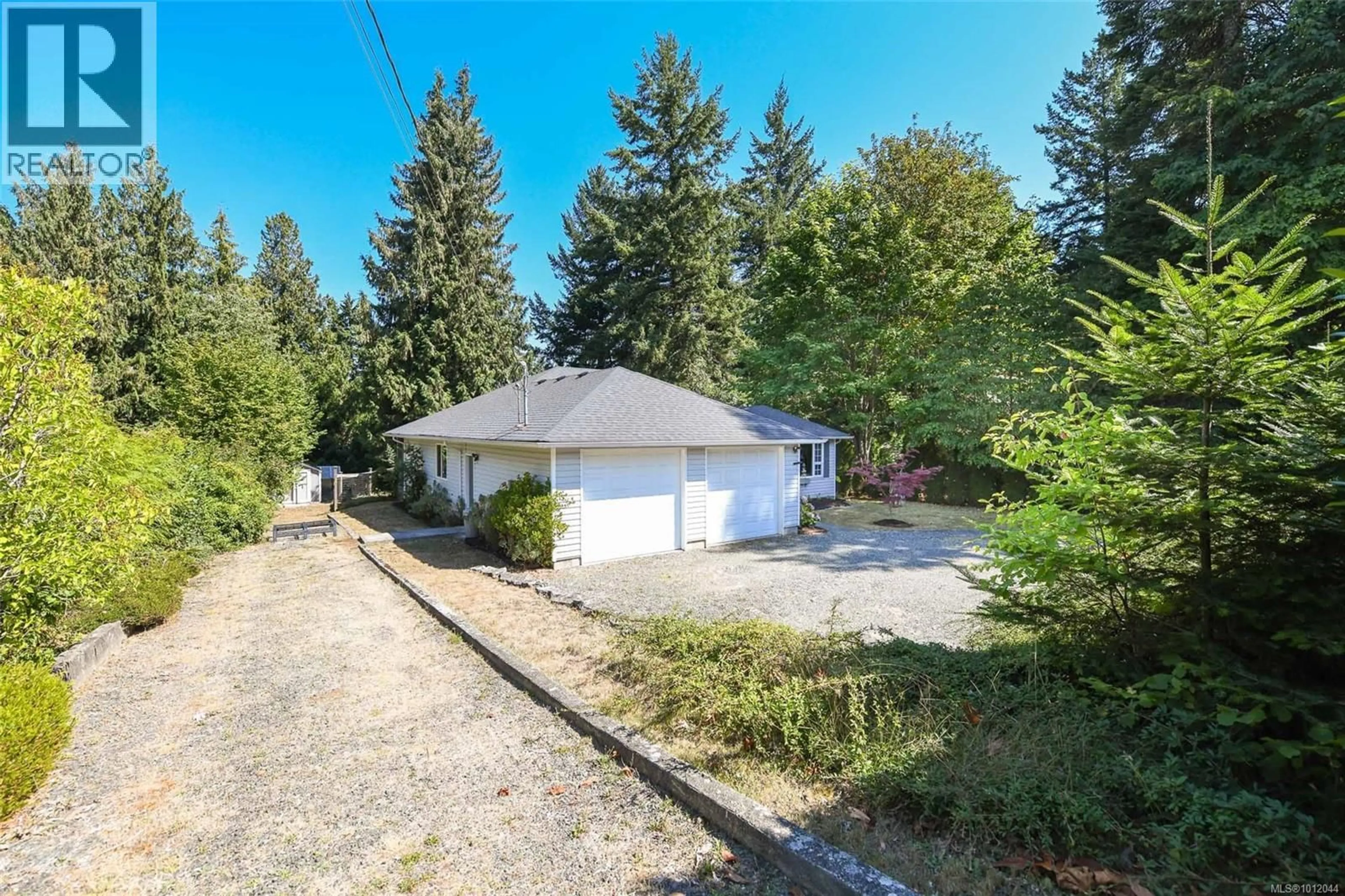 A pic from outside/outdoor area/front of a property/back of a property/a pic from drone, unknown for 7730 VIVIAN WAY, Fanny Bay British Columbia V0R2W0