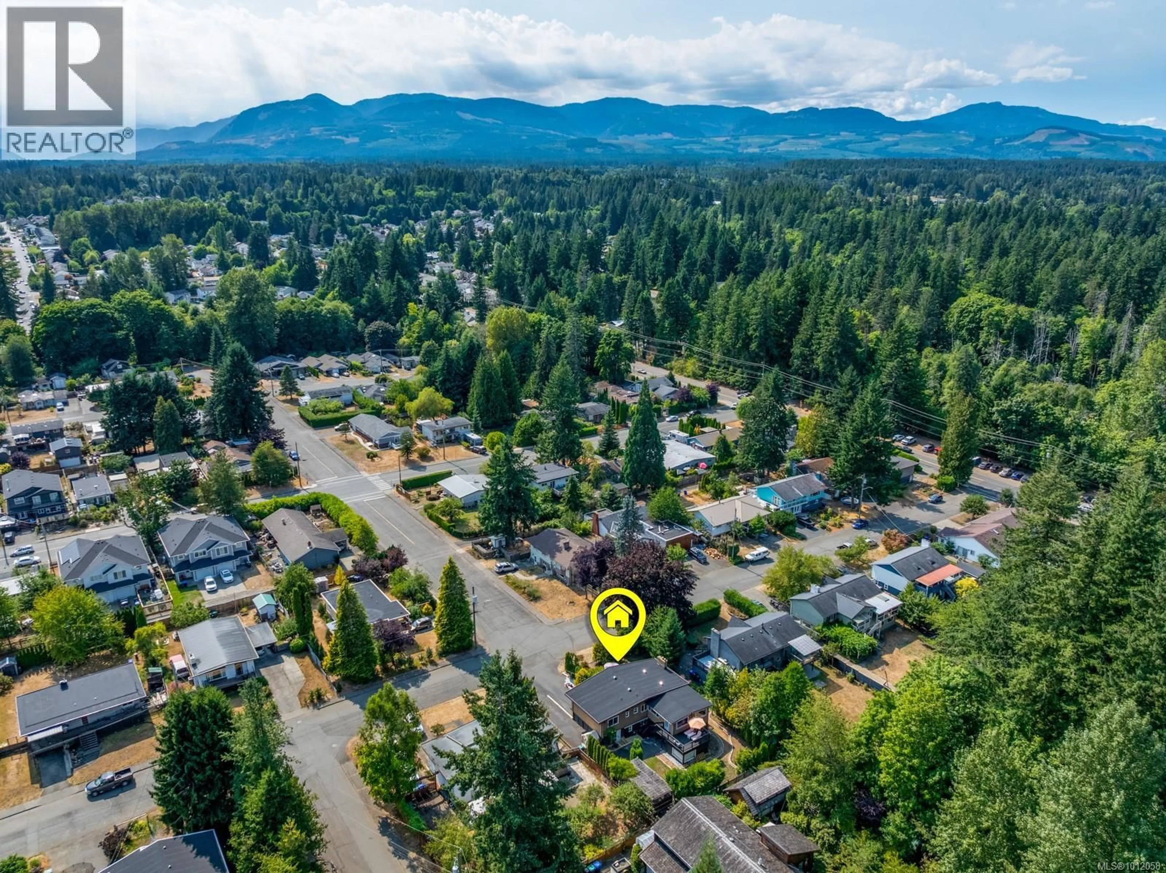 A pic from outside/outdoor area/front of a property/back of a property/a pic from drone, mountain view for 220 URQUHART AVENUE, Courtenay British Columbia V9N3K1